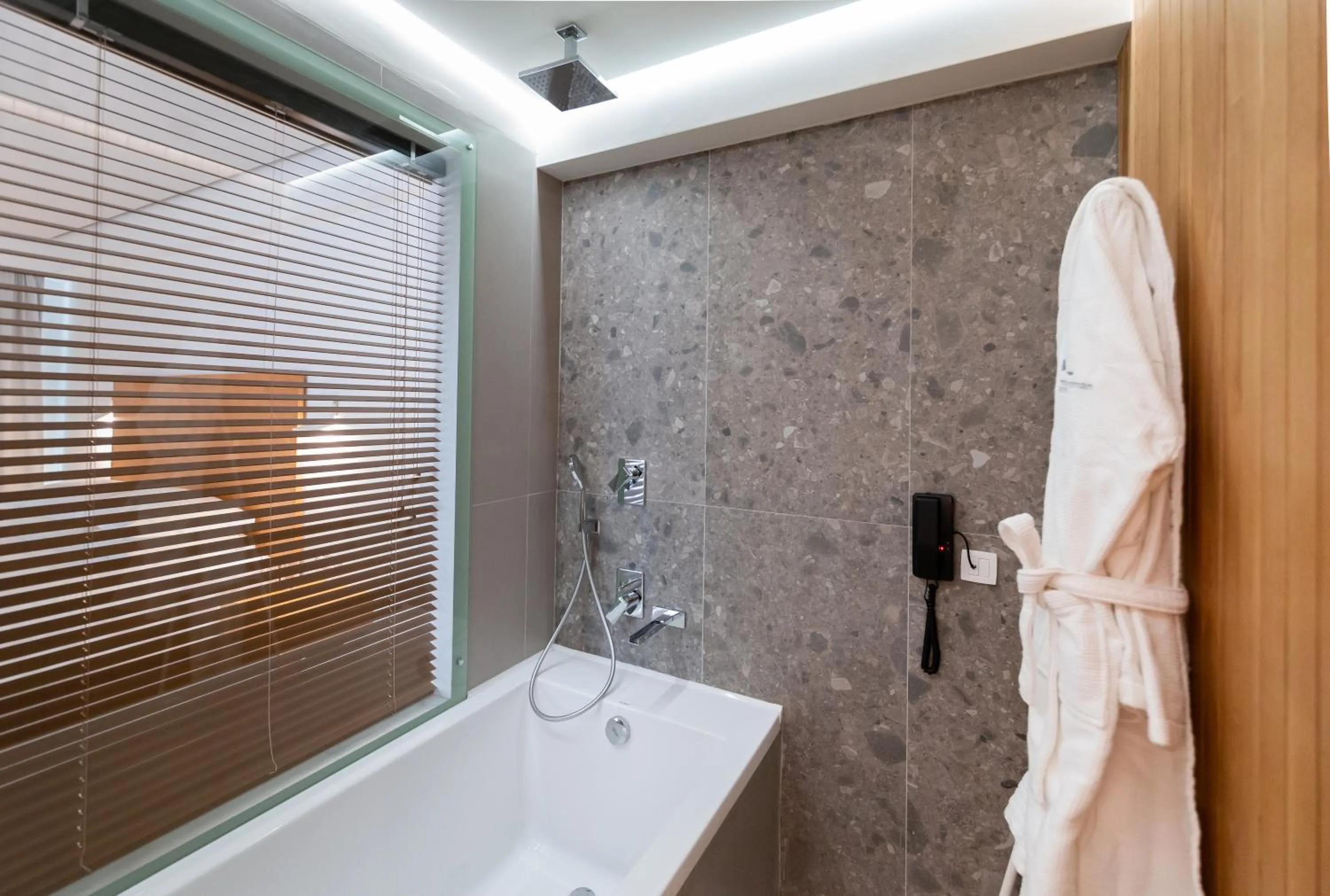 Shower in Messinian Icon Hotel & Suites