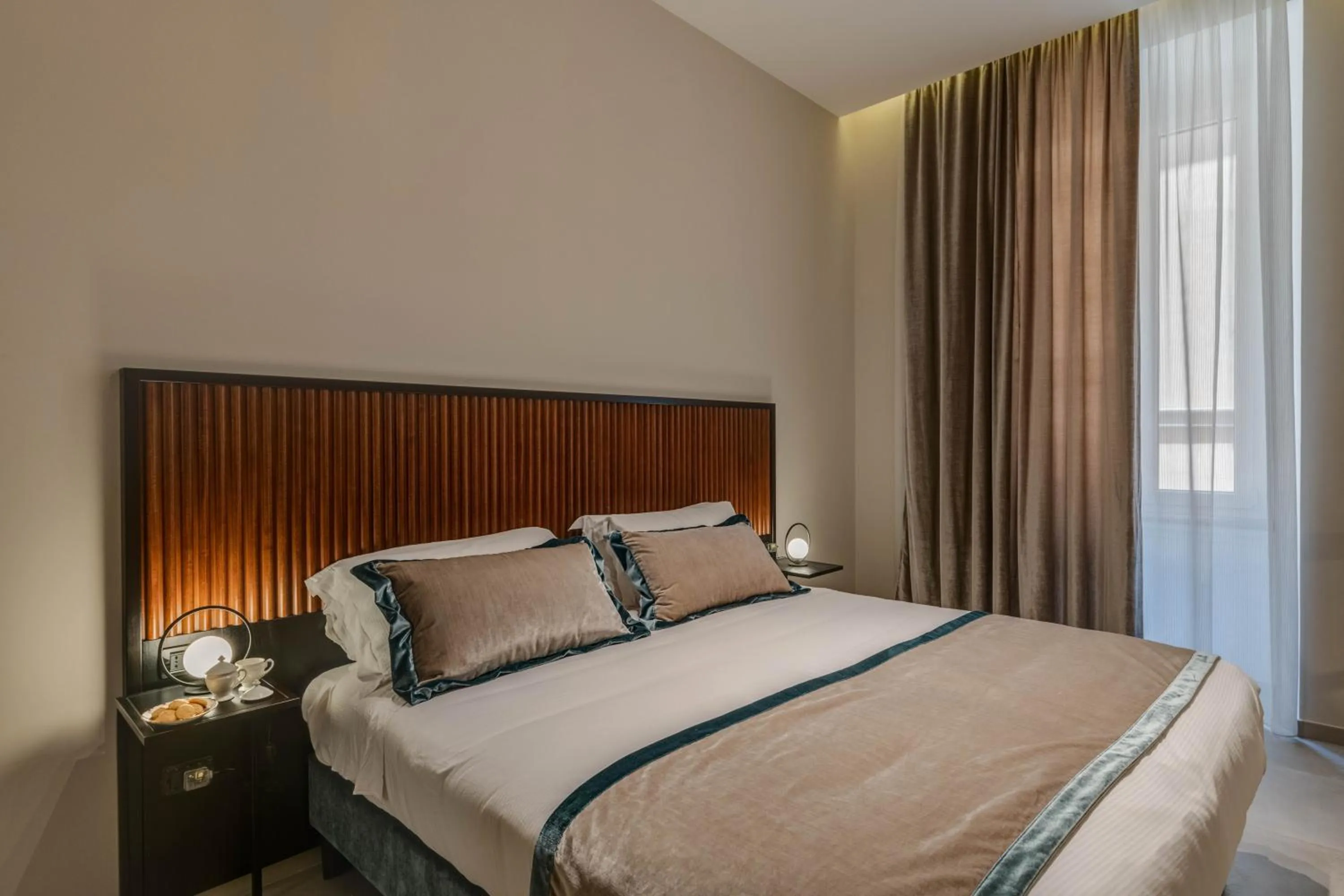 Bed in Adrianus Hotel