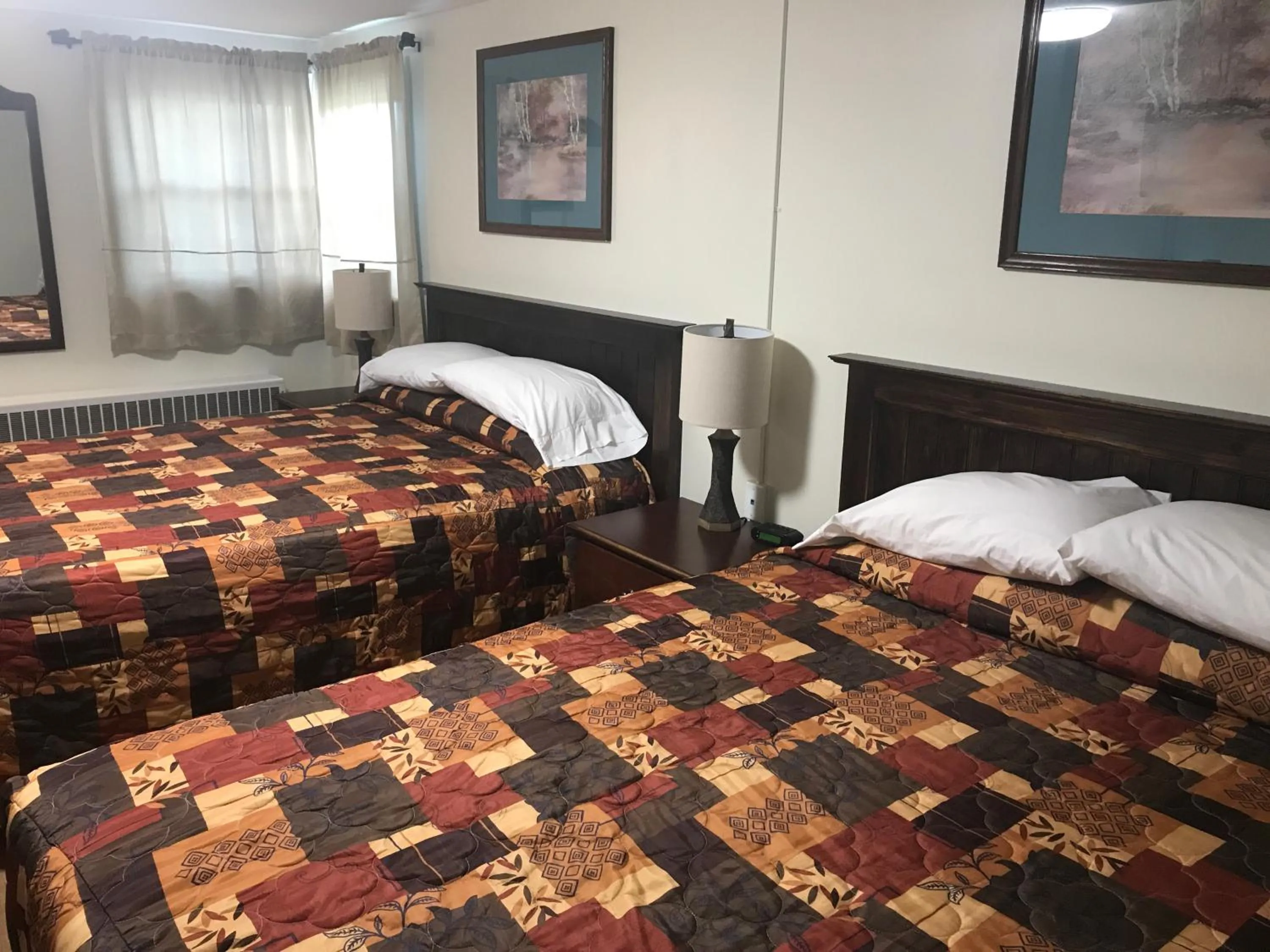 Bed in Evergreen Motel