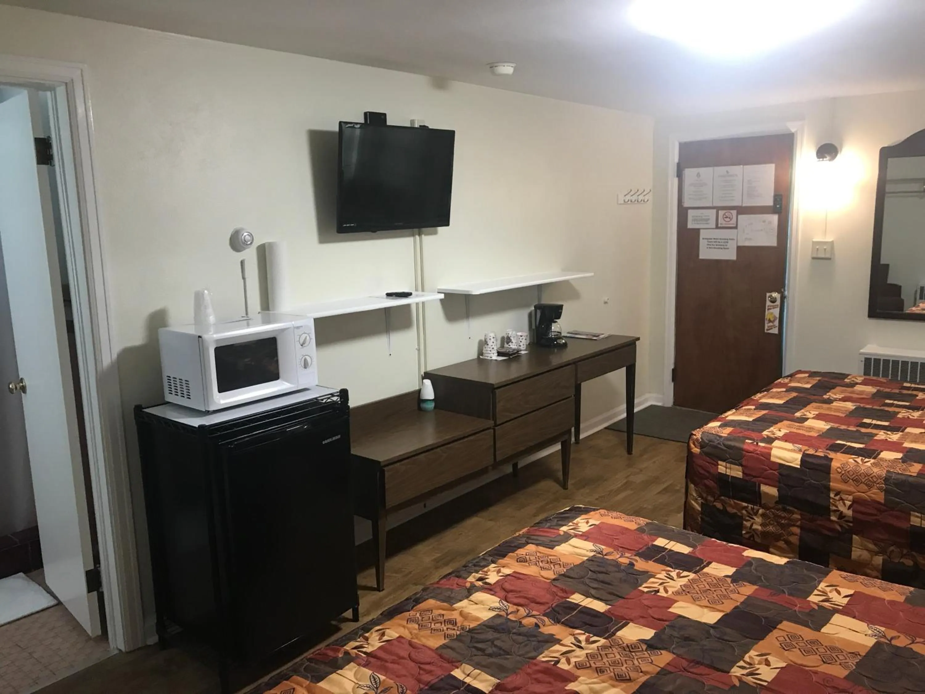 Bed in Evergreen Motel