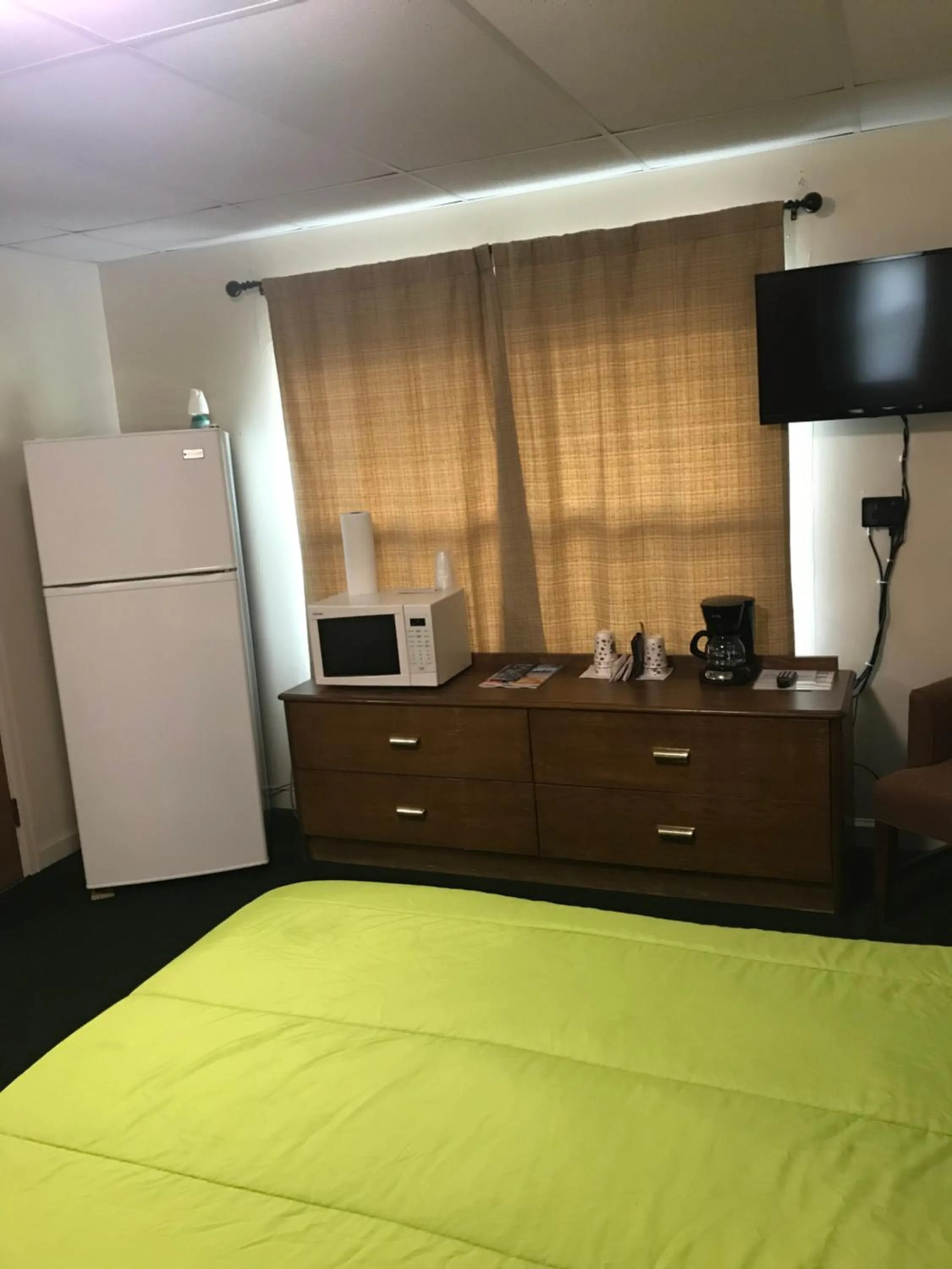 Bed in Evergreen Motel