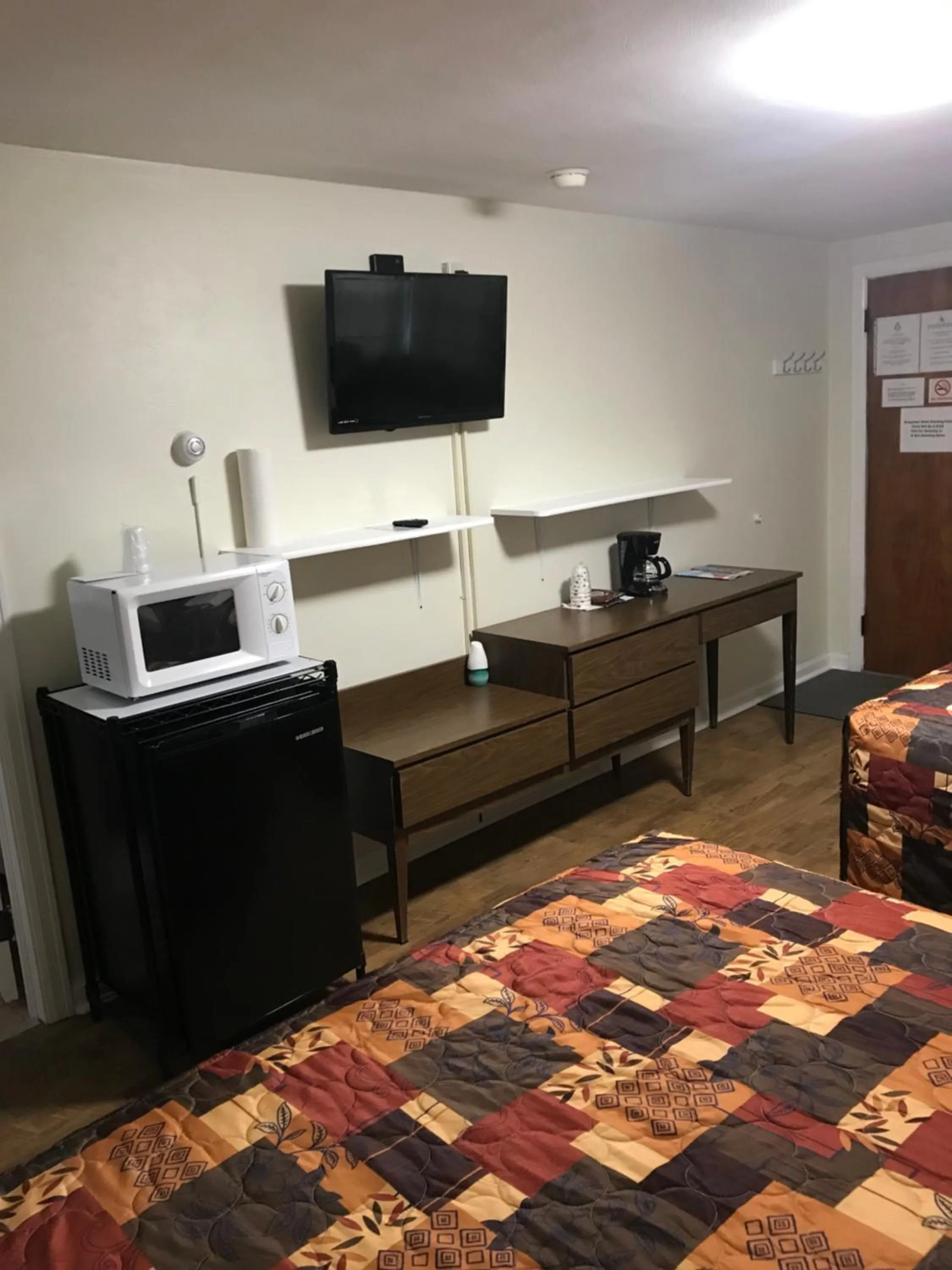 Bed in Evergreen Motel