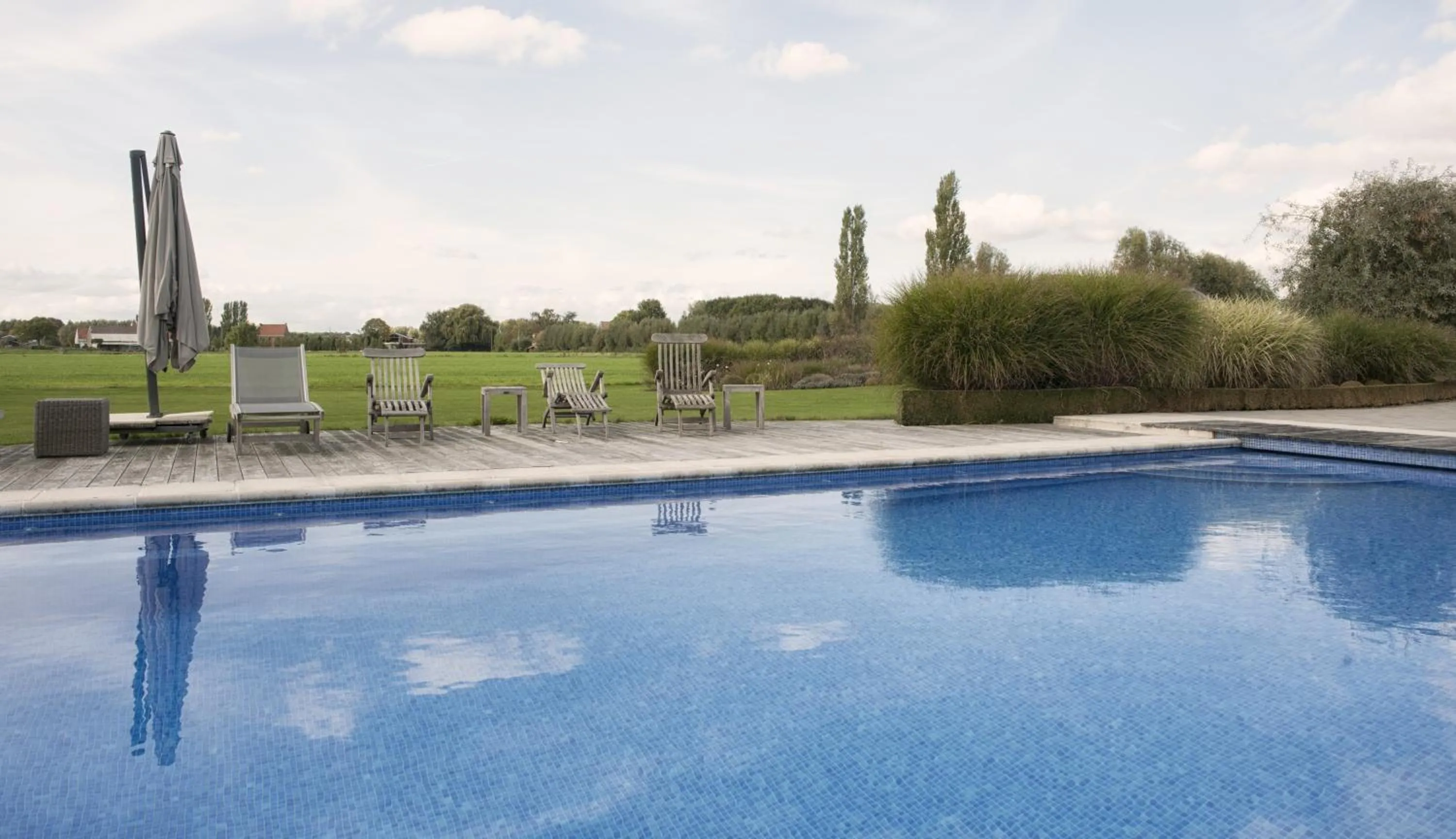 Swimming pool in B&B Au Grenier