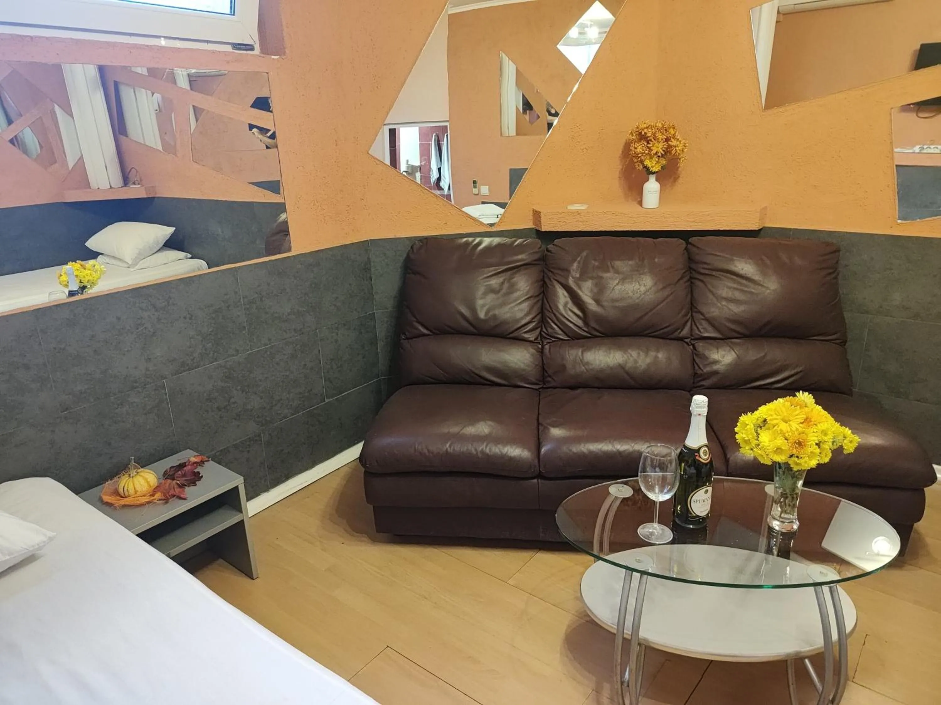 Seating area, Bed in Paralax Hotel