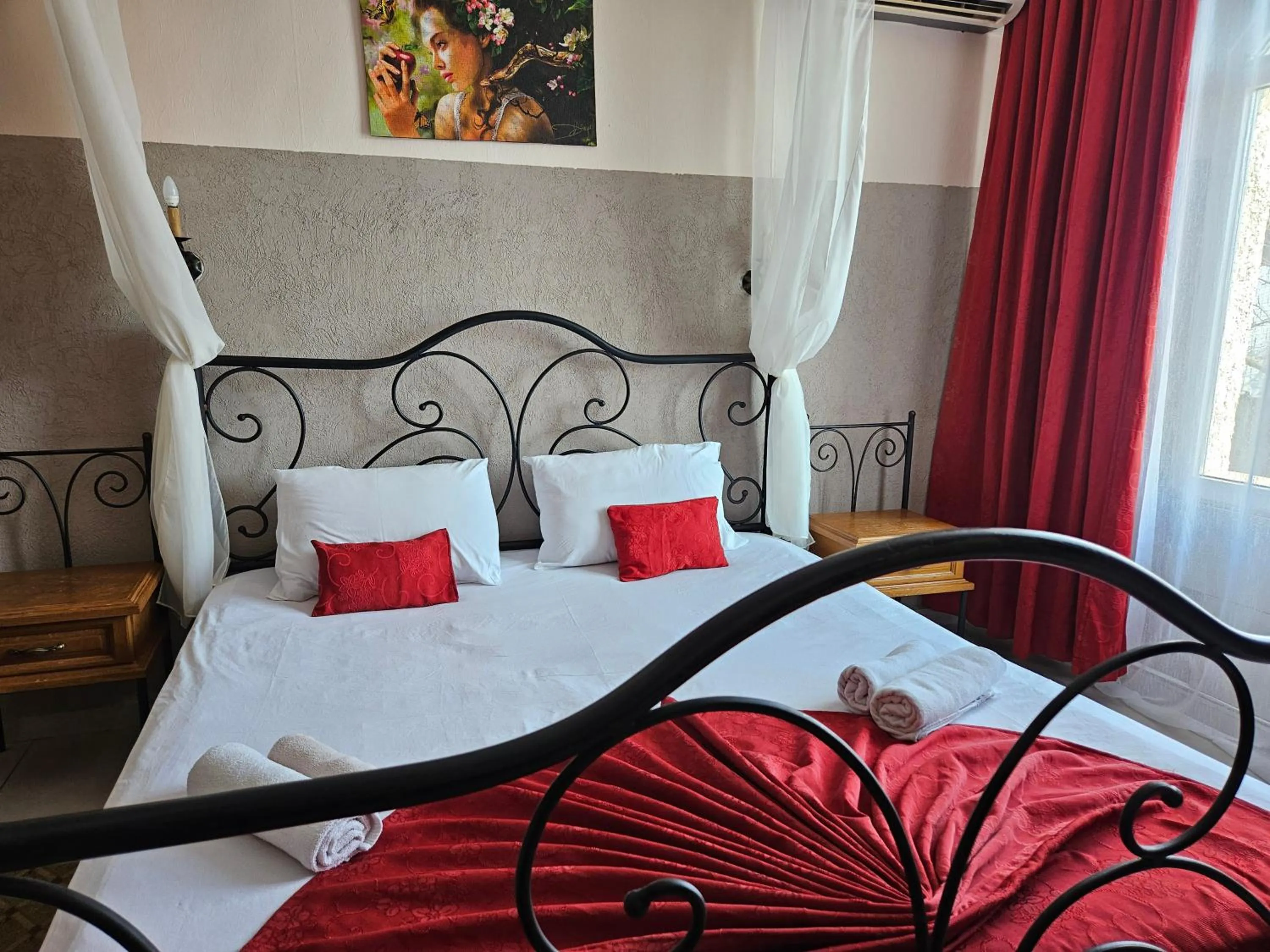 Bed in Paralax Hotel