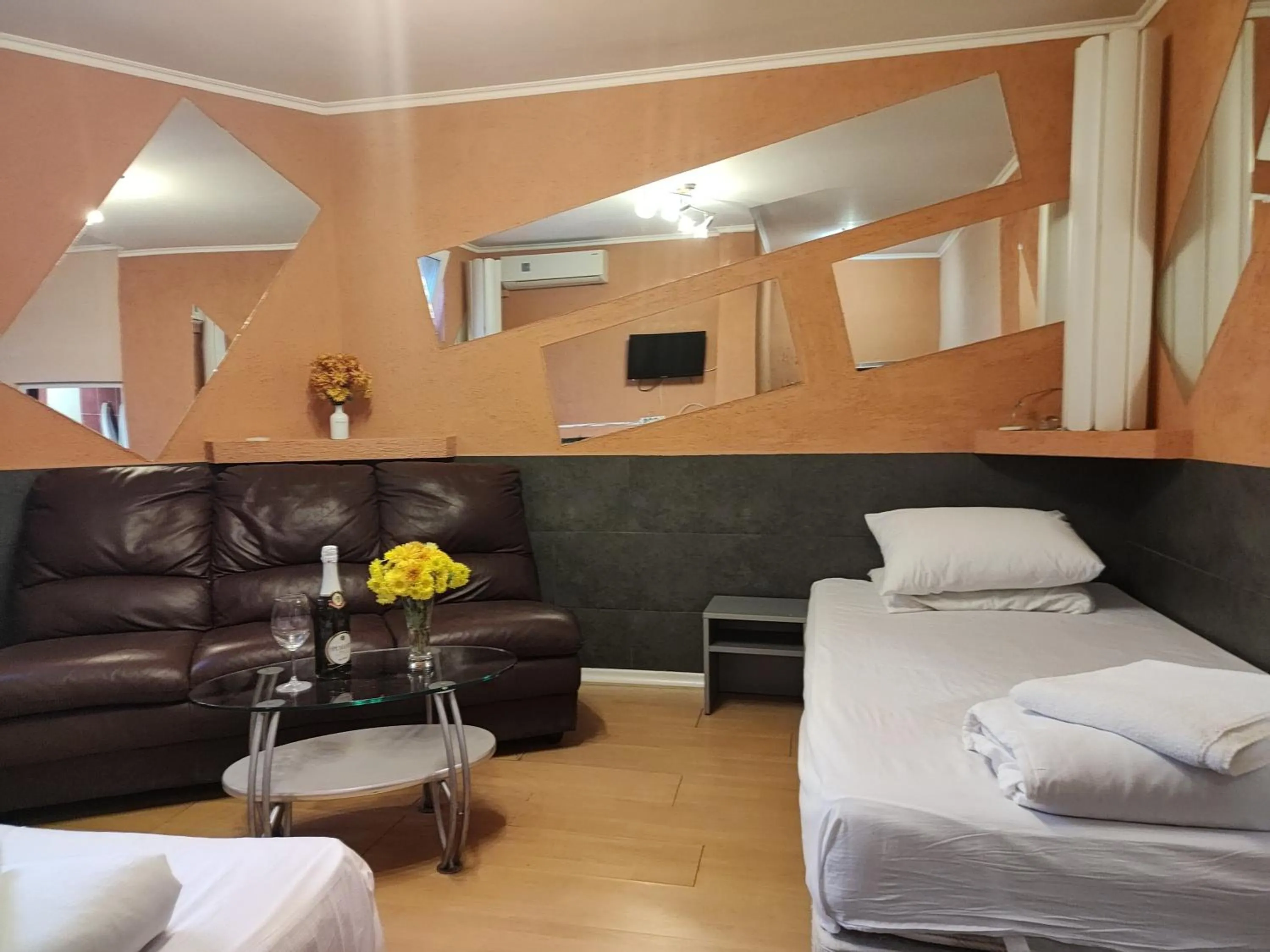 Bed in Paralax Hotel