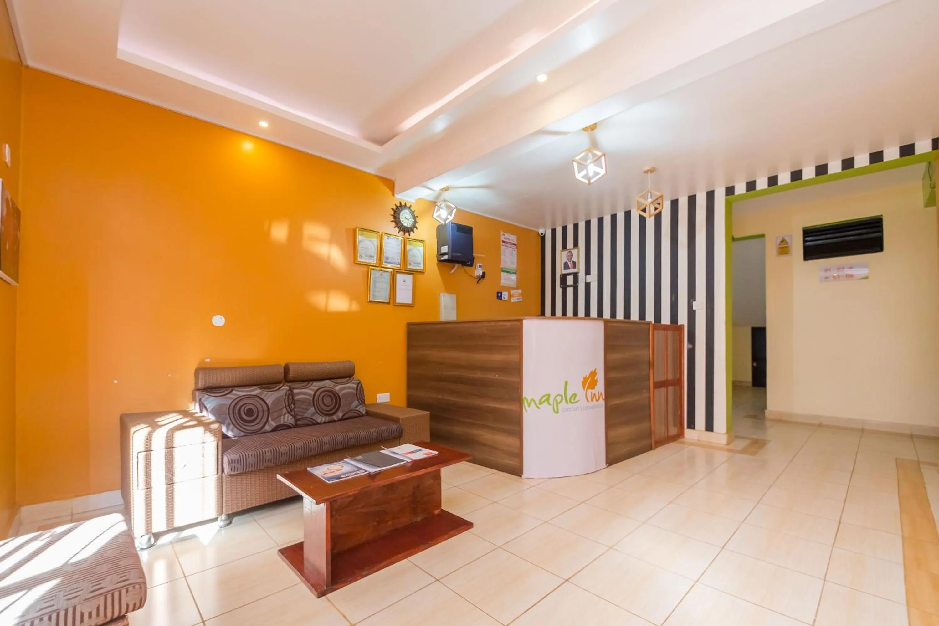 Lobby or reception in Maple Inn Hotel