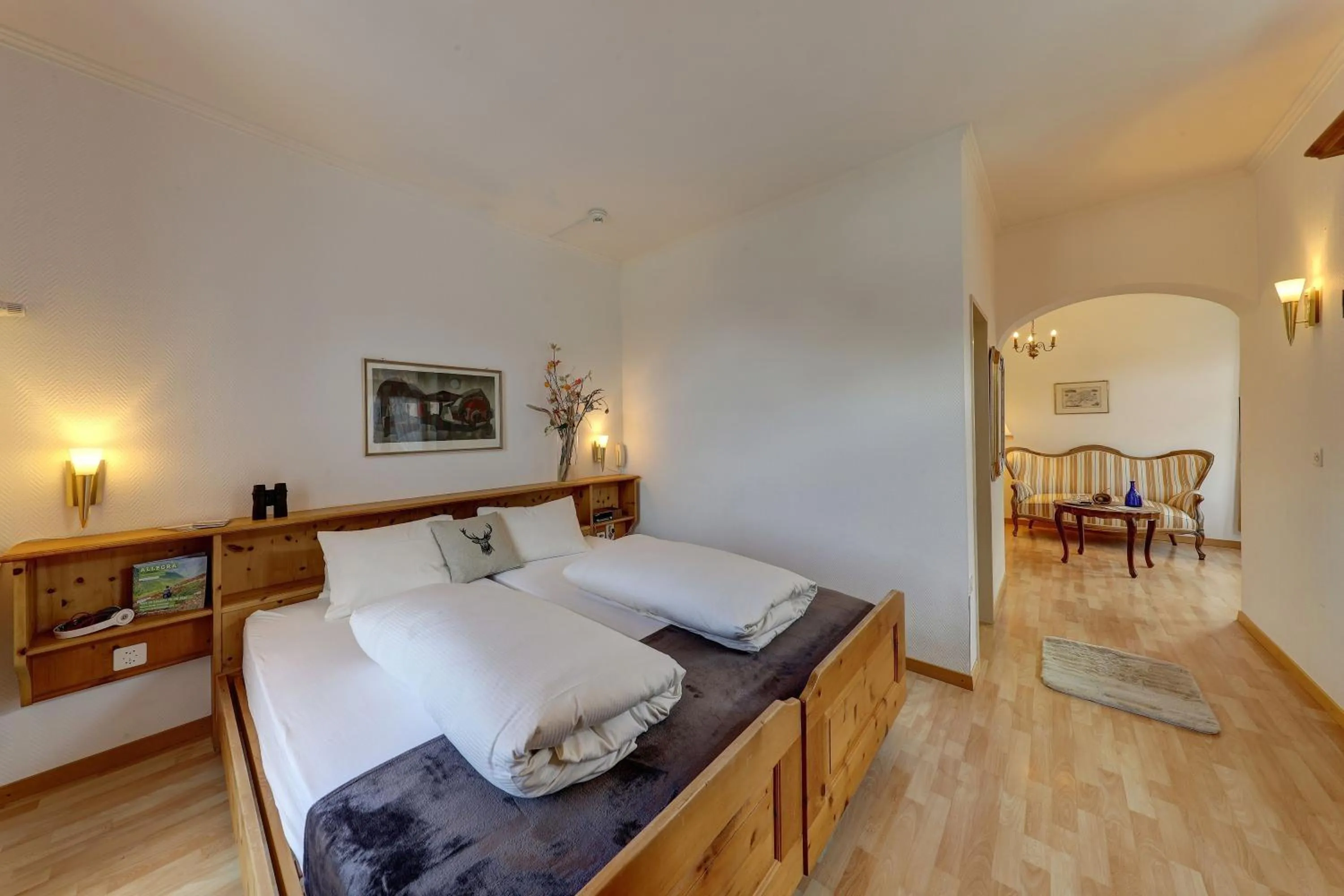 Photo of the whole room, Bed in Hotel Schweizerhof Sta Maria