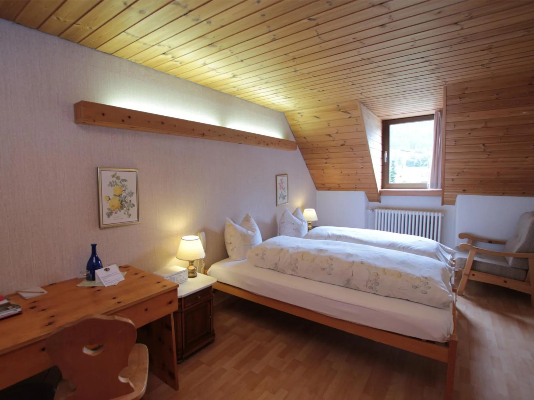 Photo of the whole room, Bed in Hotel Schweizerhof Sta Maria