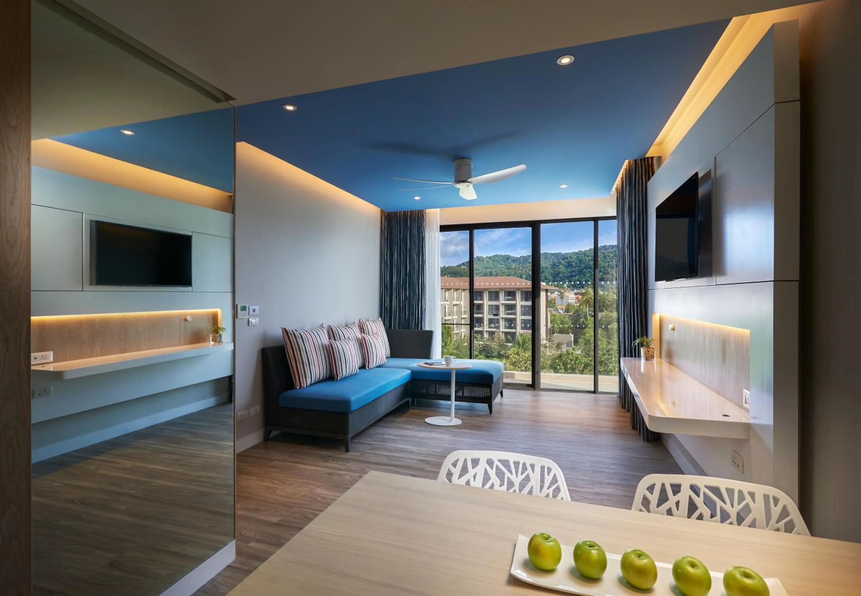 Living room, Bed in OZO Phuket