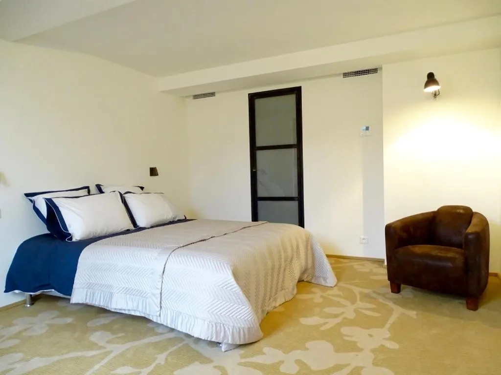 Bed in Demeure d'hôtes Le Rocher