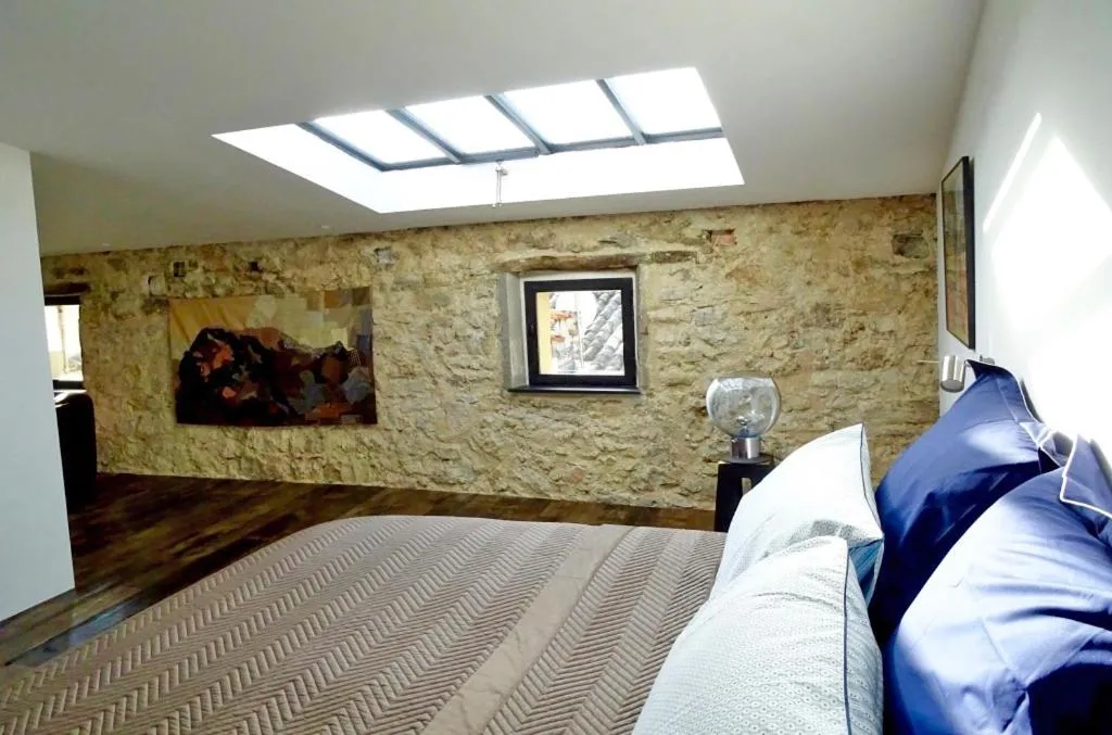 Bed in Demeure d'hôtes Le Rocher