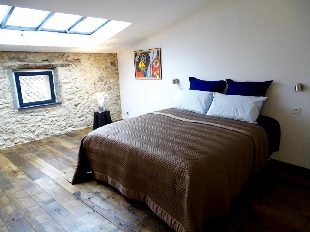 Bed in Demeure d'hôtes Le Rocher