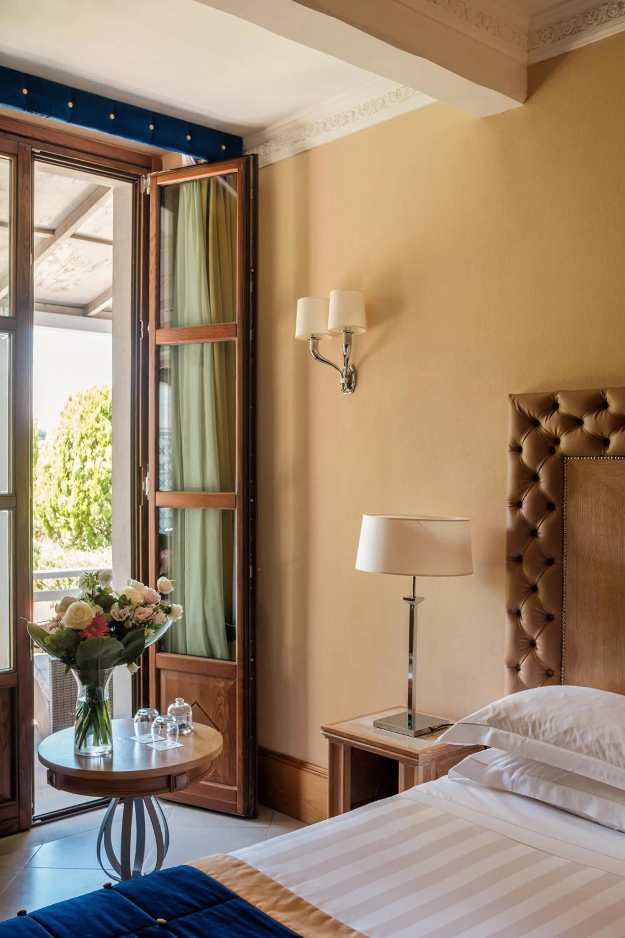 Bed in Villa Tolomei Hotel & Resort