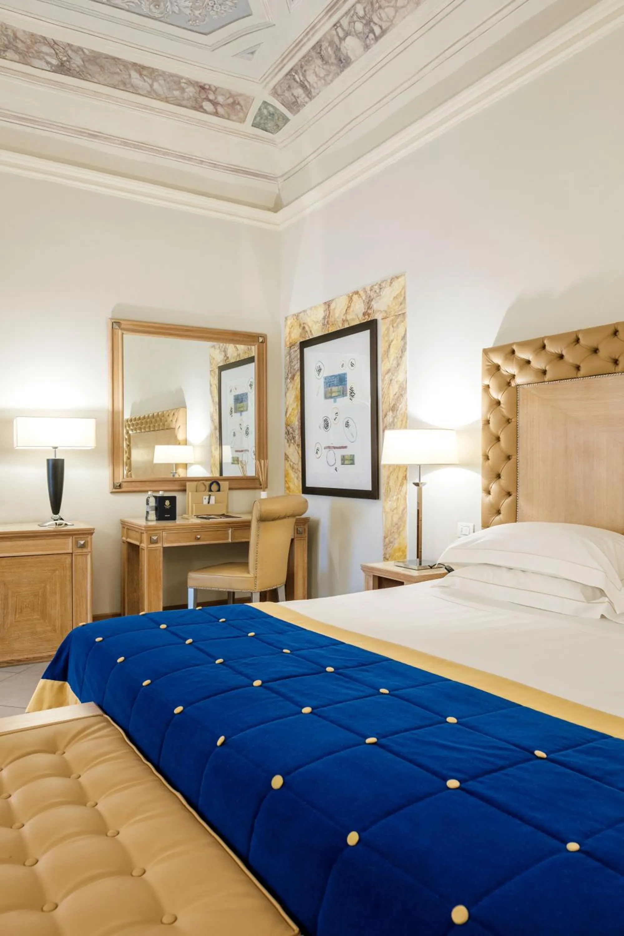 Bed in Villa Tolomei Hotel & Resort