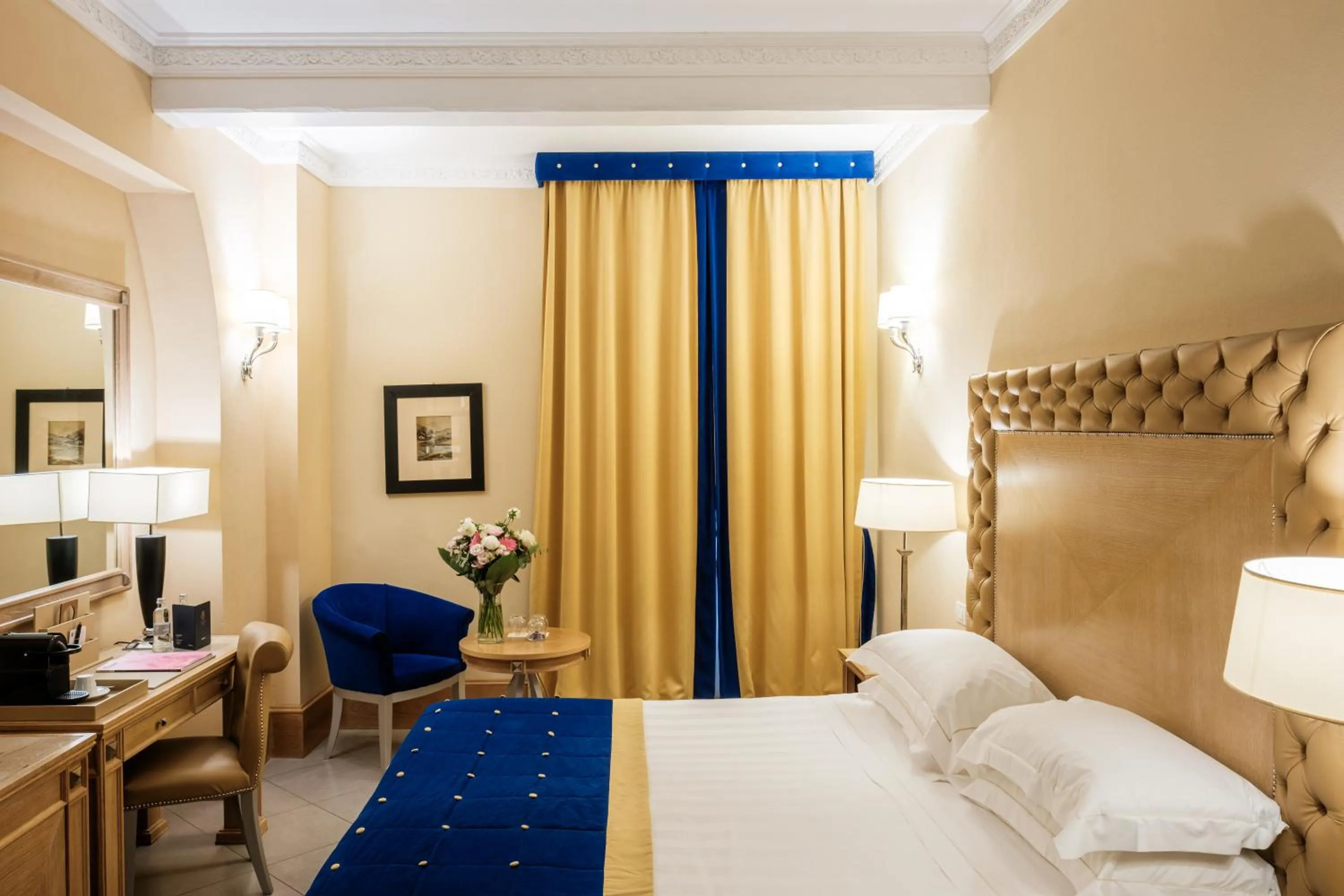 Bed in Villa Tolomei Hotel & Resort