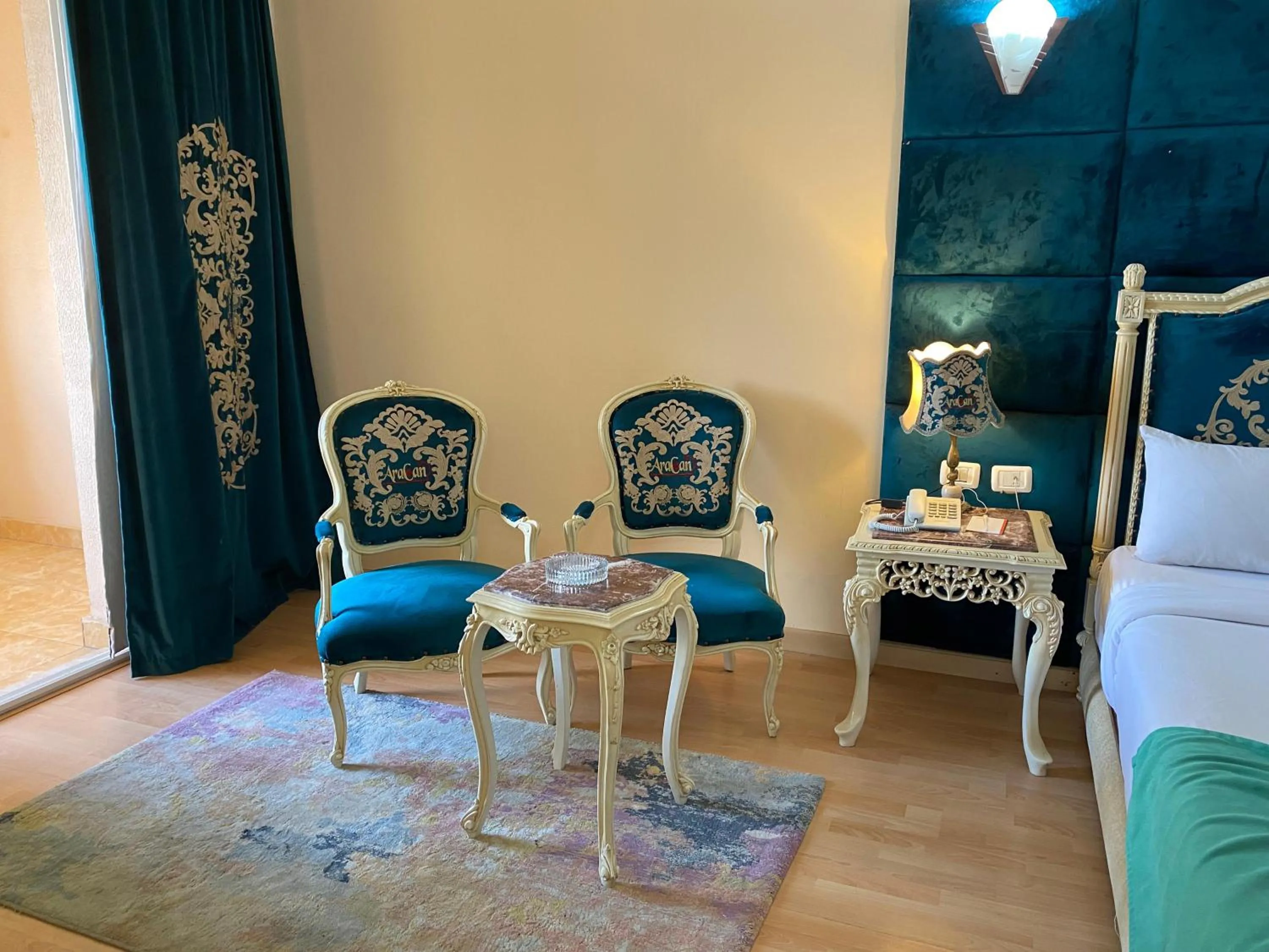 Seating area, Bed in Aracan Portsaid