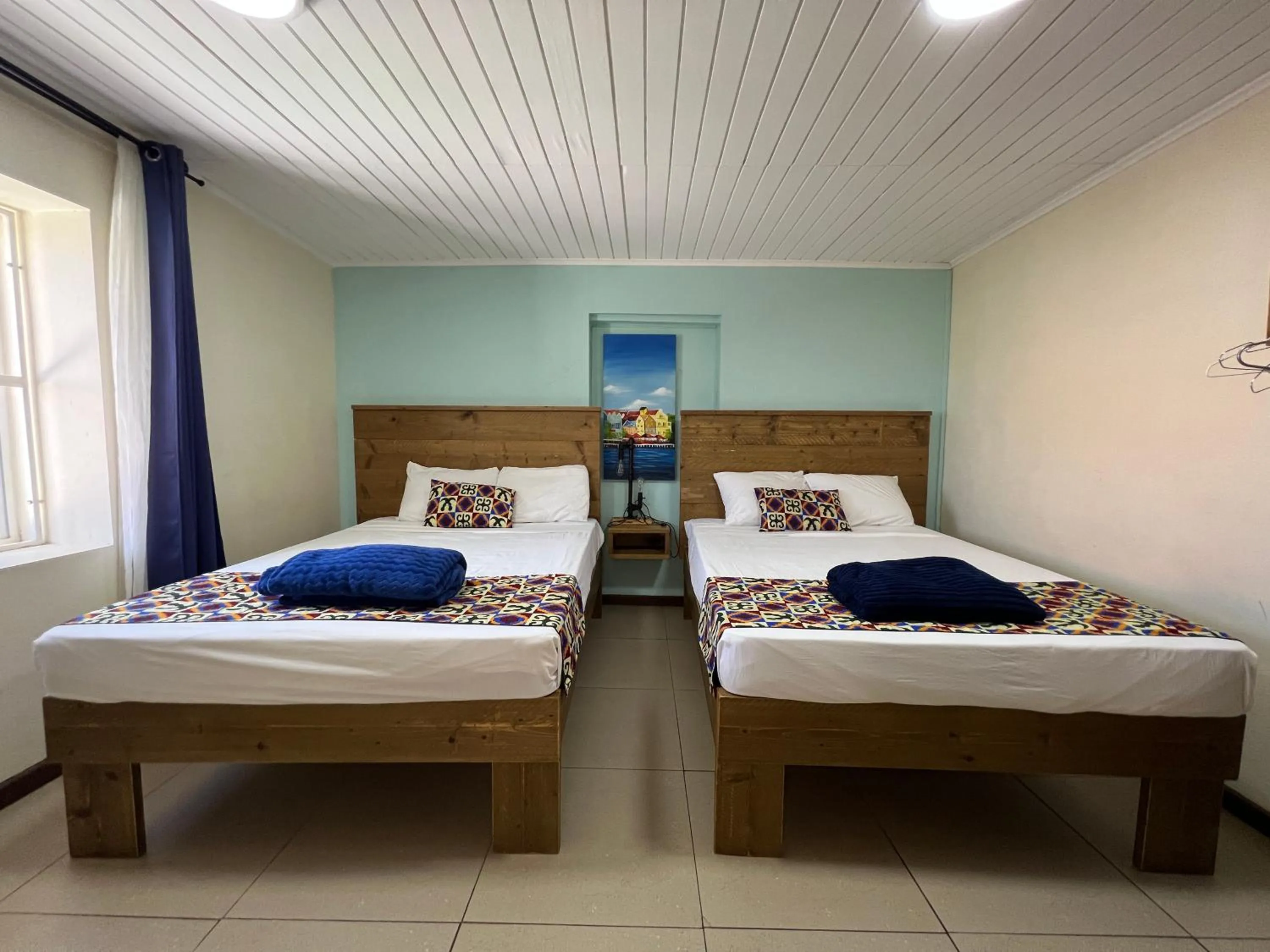 Bed in Mustique Suites Curacao