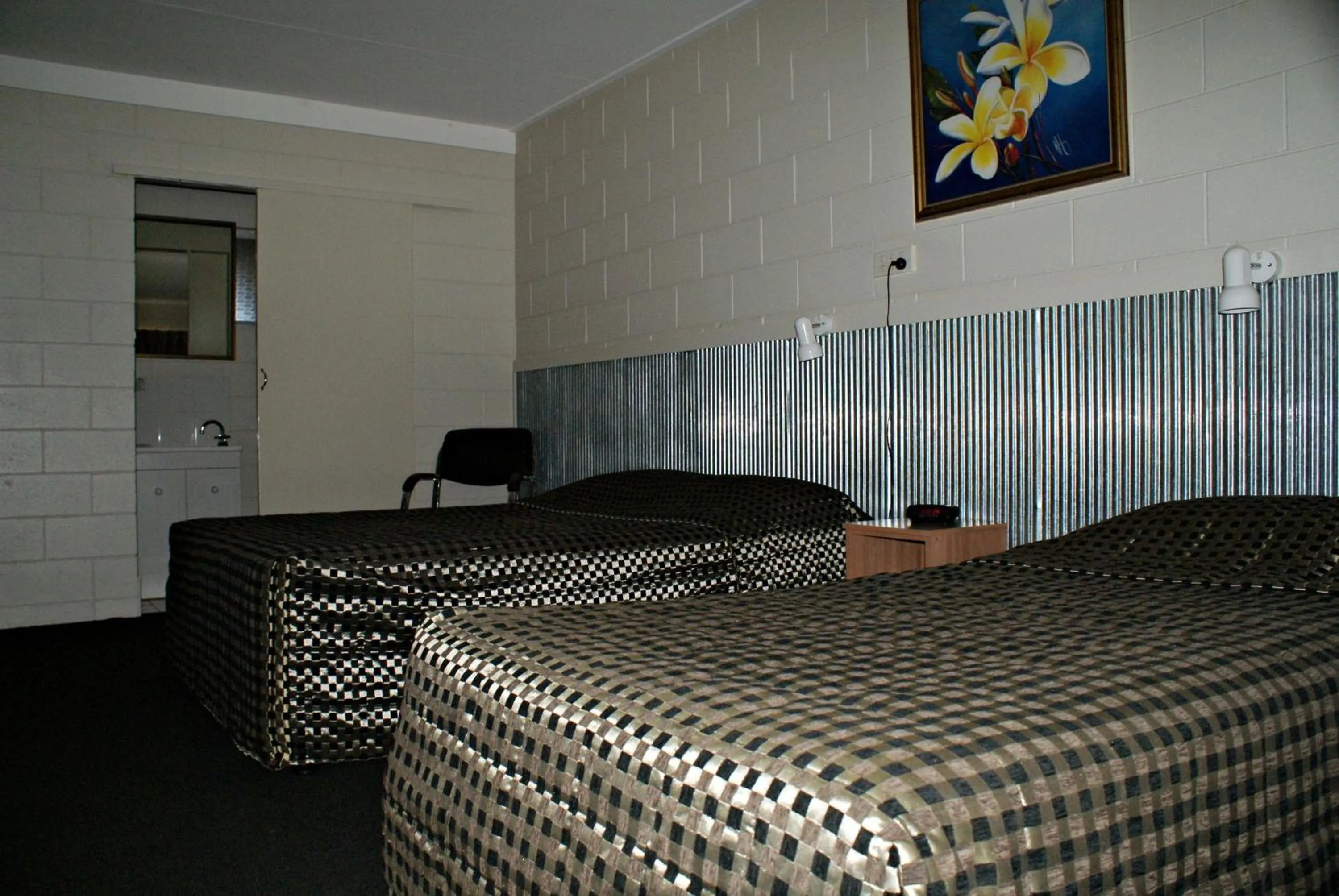 Bed in Black Diamond Motel