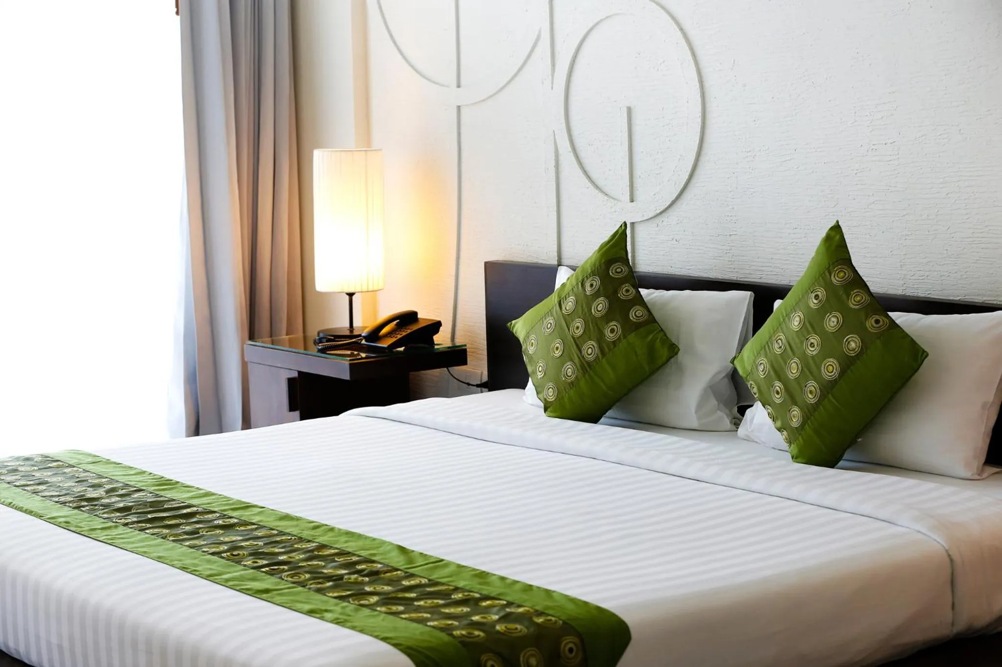 Bed in The Palmery Resort