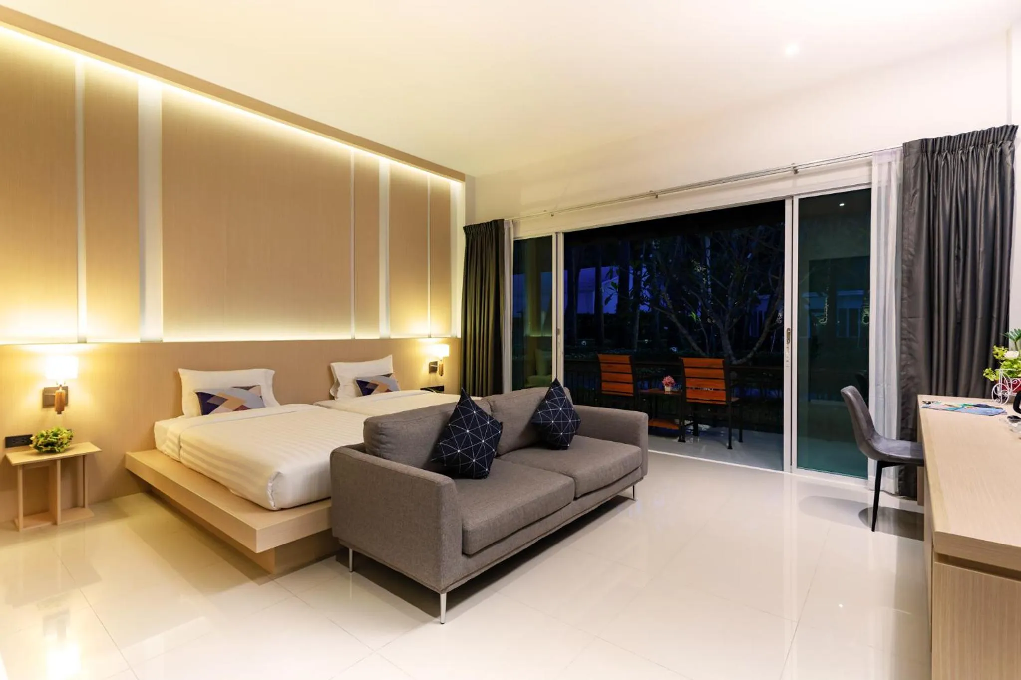 Seating area, Bed in The Palmery Resort