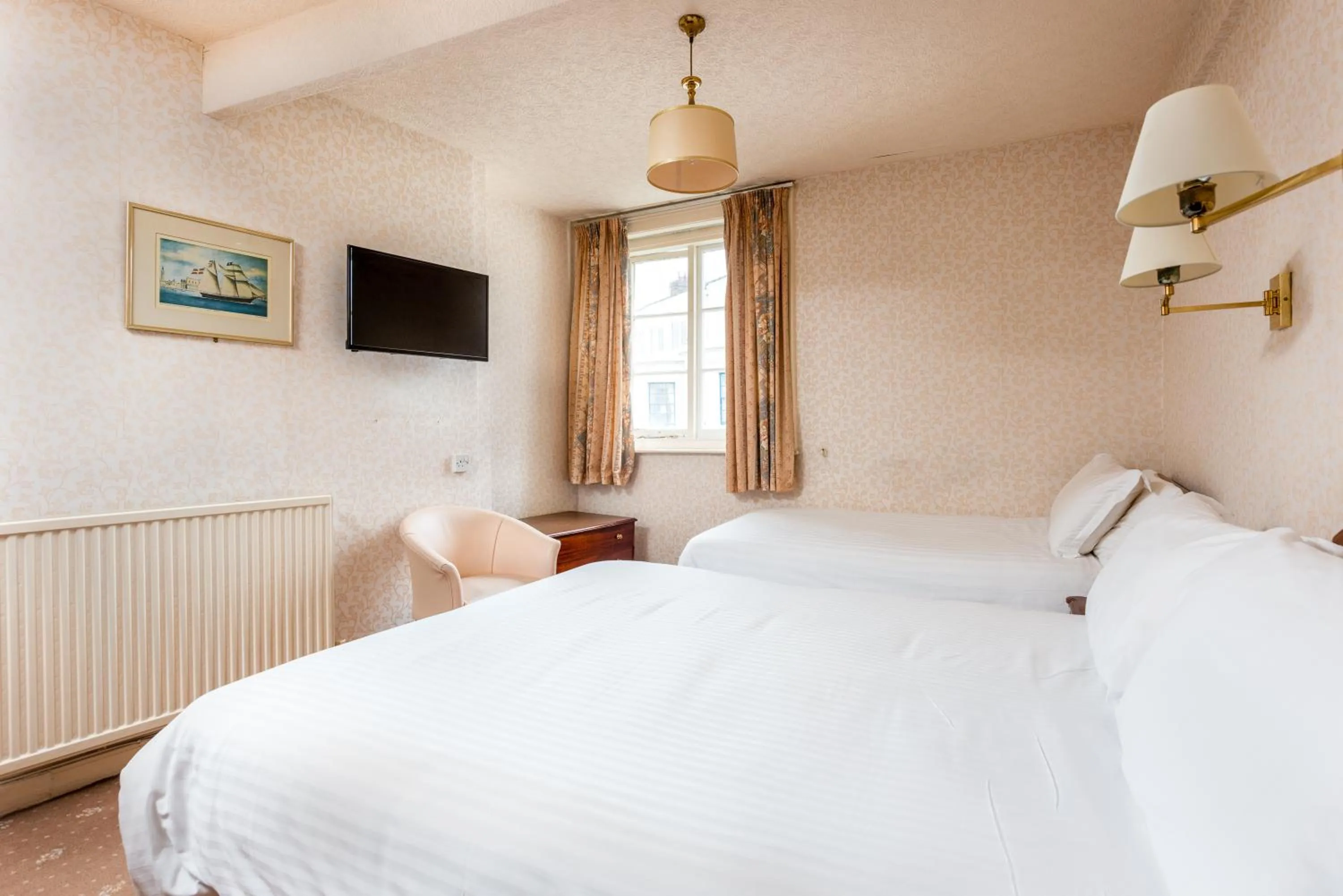 Bed in The Esplanade Hotel