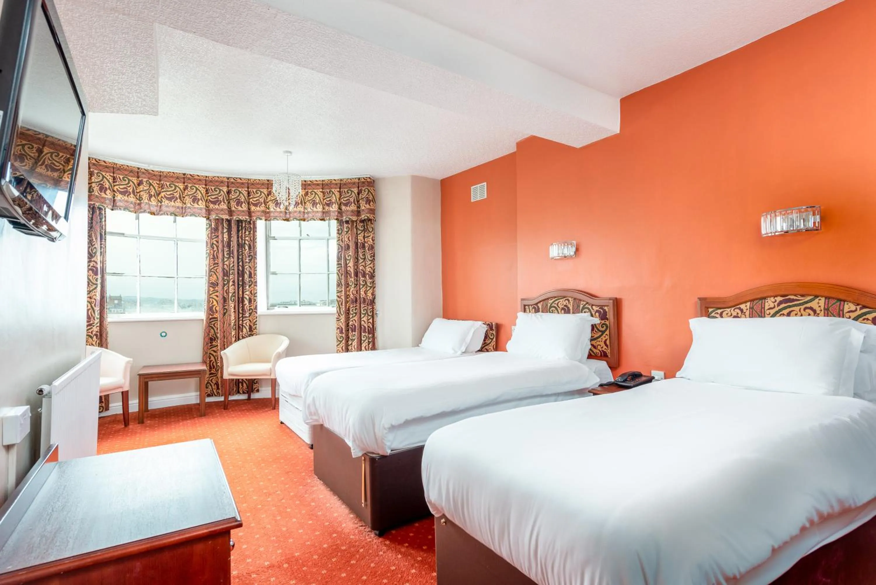 Bed in The Esplanade Hotel