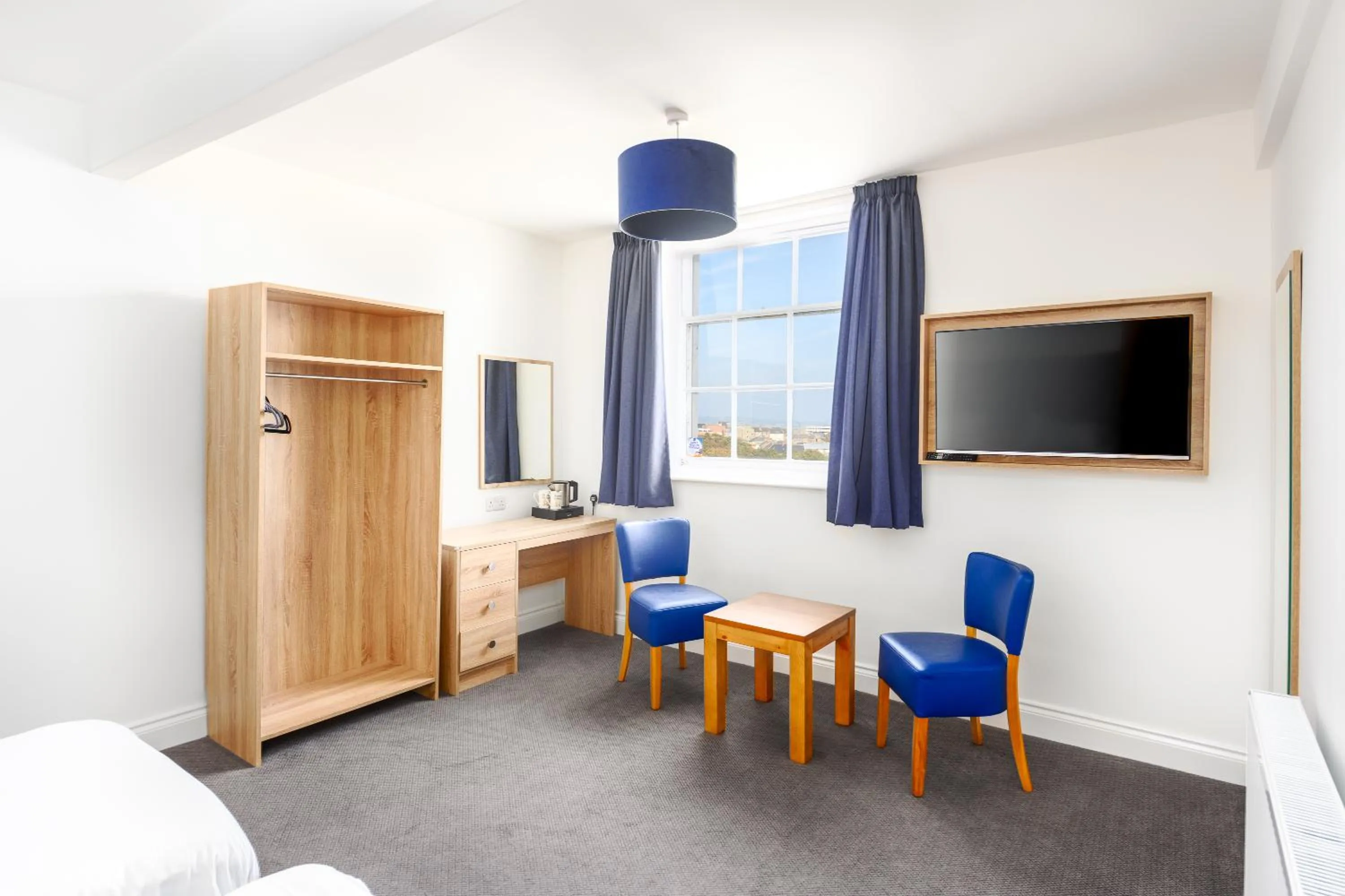Bedroom in The Esplanade Hotel