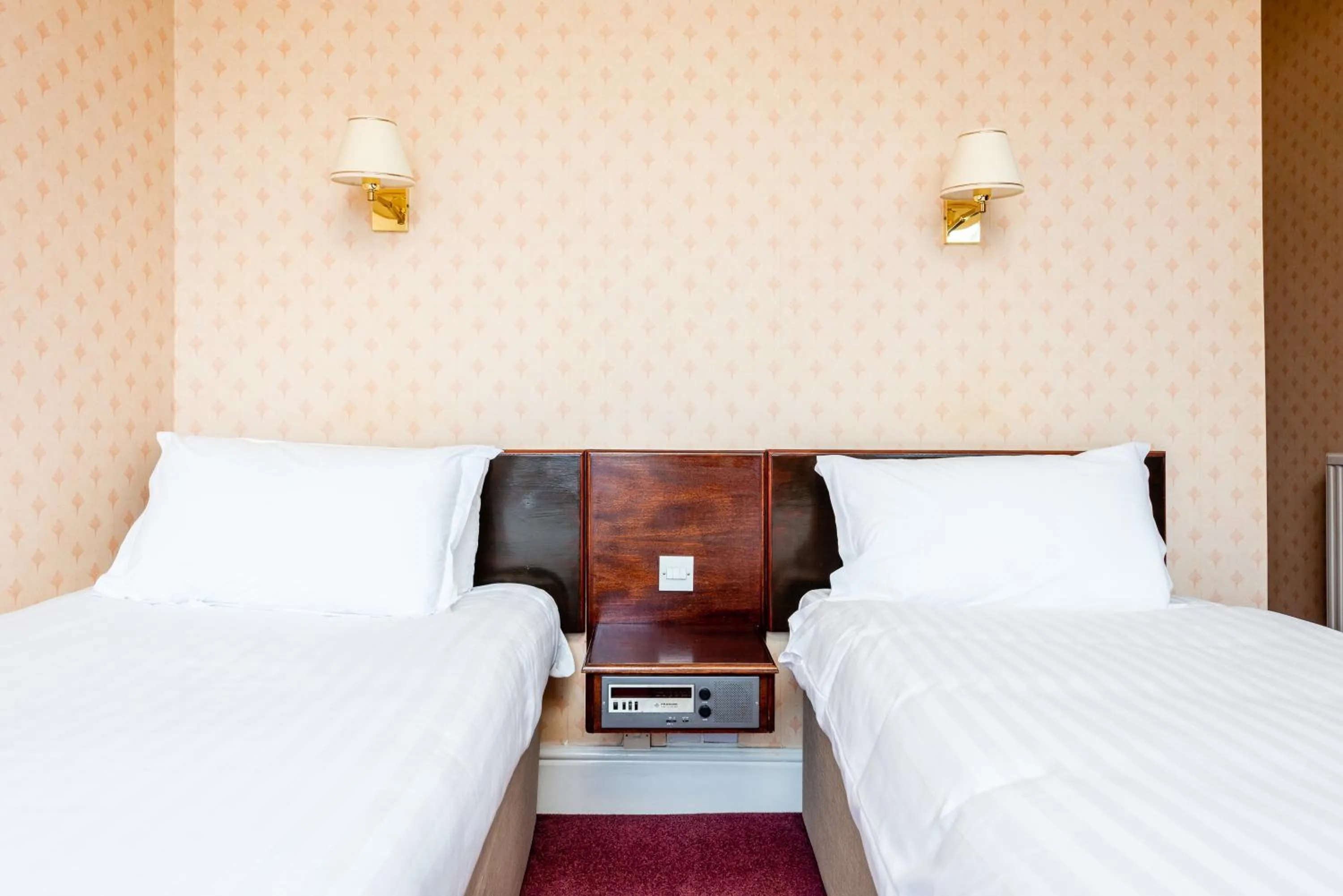 Bed in The Esplanade Hotel