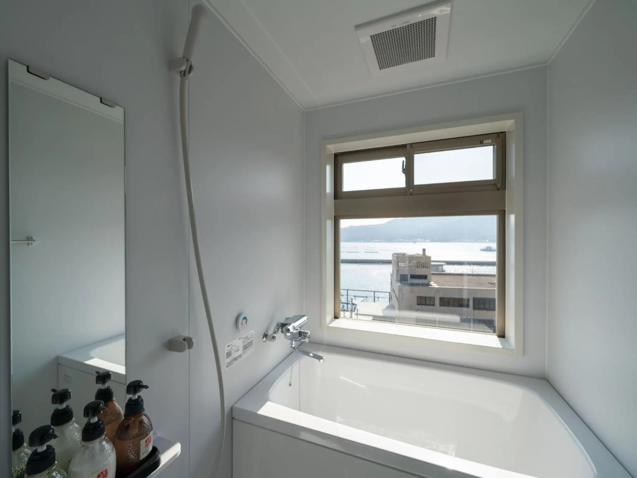 Shower in Ryokan with natural hot springs and okonomiyaki Miyajima-an Hiroshima