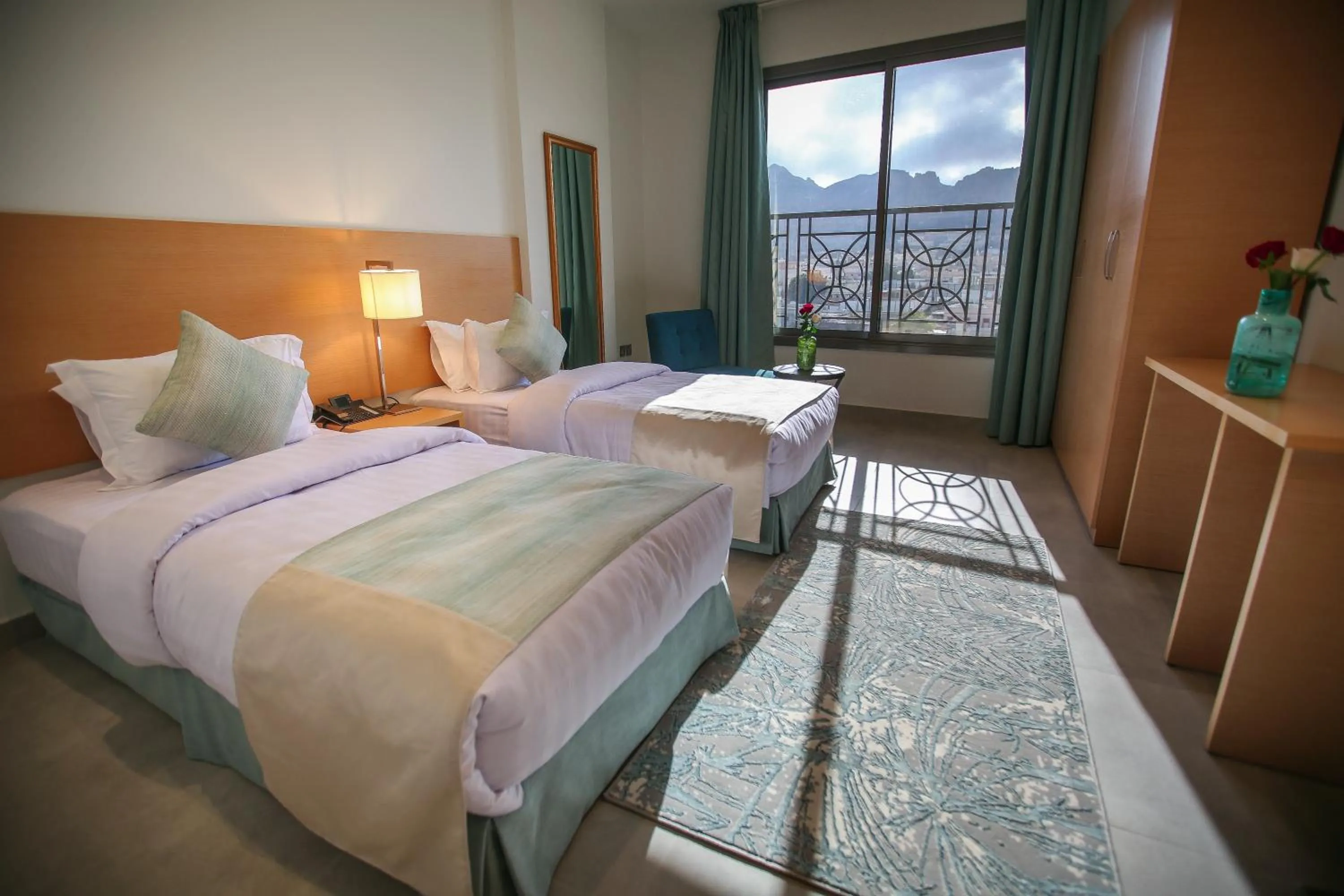 Bed in Tanuma Aram Hospitality - Hotel Apartments