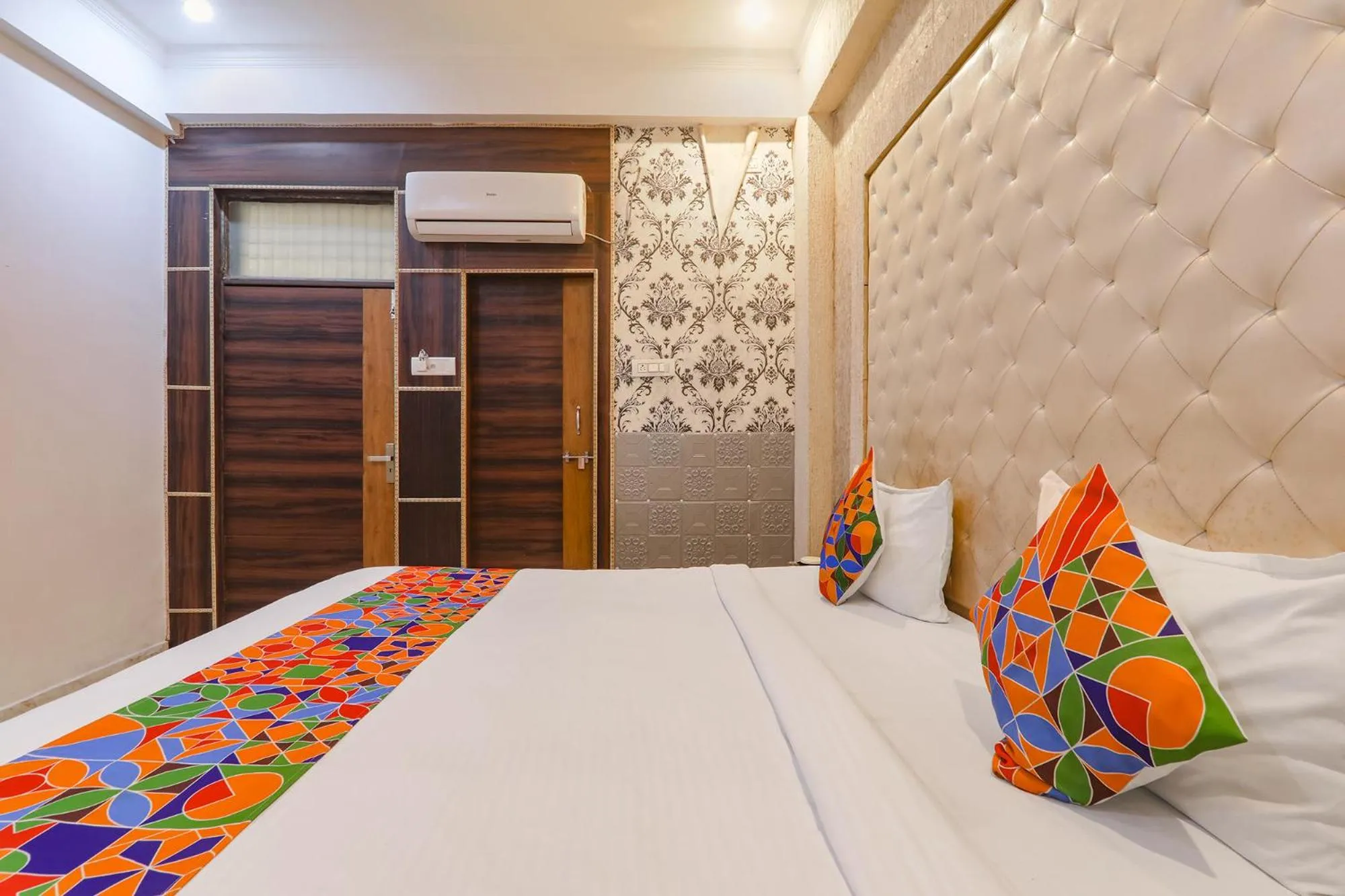 Bed in FabHotel Triveni