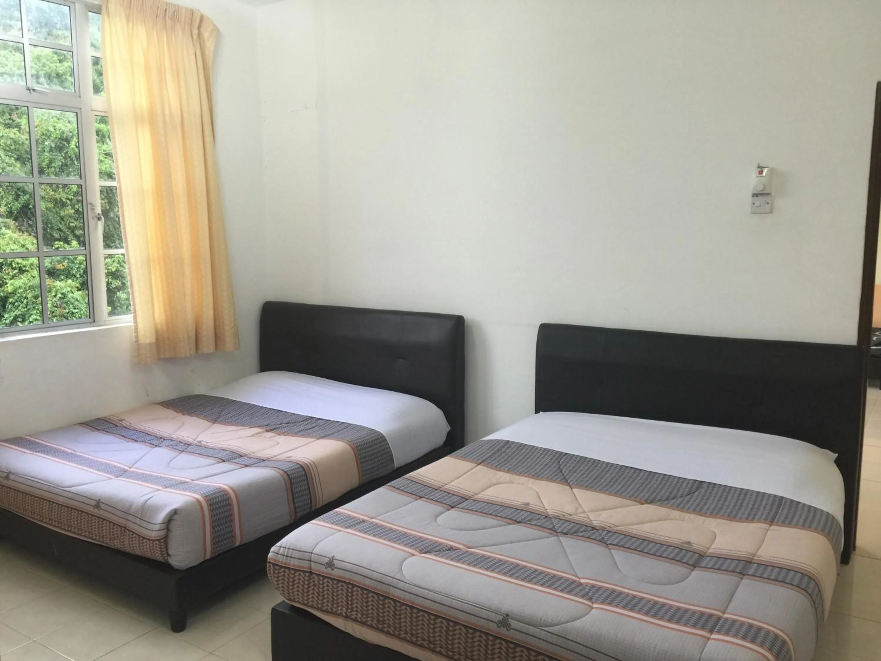 Bed in Cameron Supersave Apartment @ Crown Imperial Court