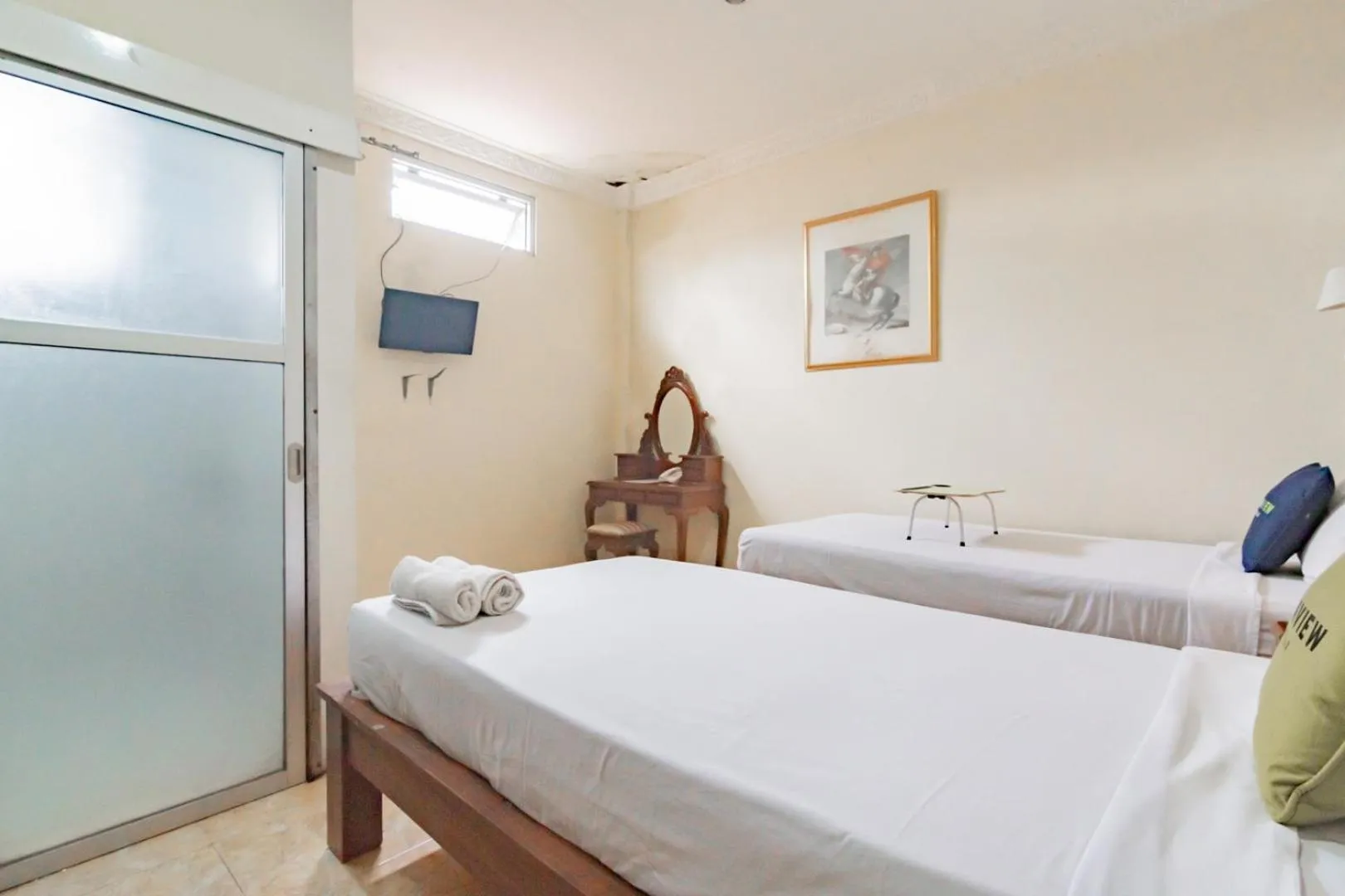 Photo of the whole room, Bed in Urbanview Hotel Mon Bel Cibodas by RedDoorz