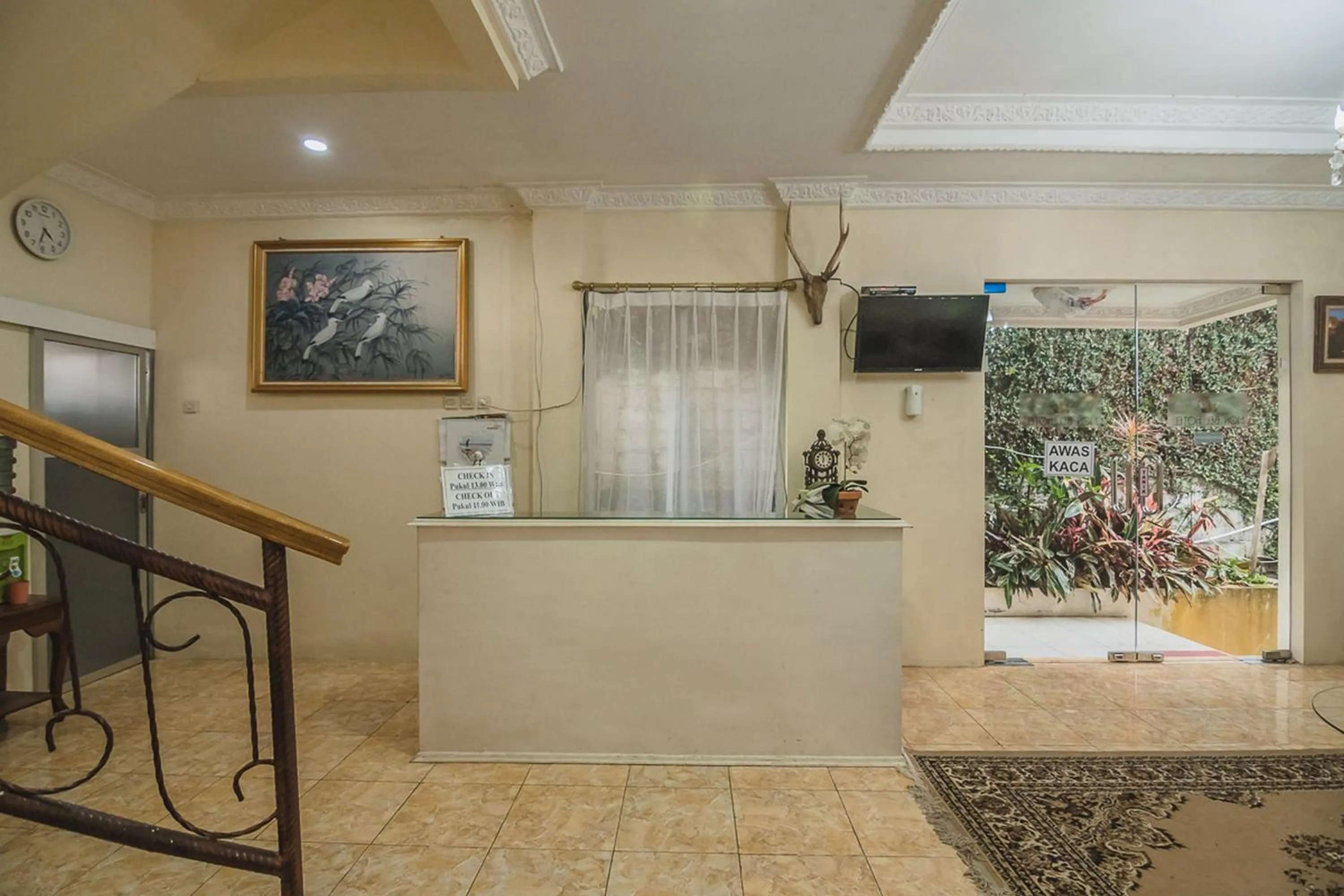 Lobby or reception in Urbanview Hotel Mon Bel Cibodas by RedDoorz