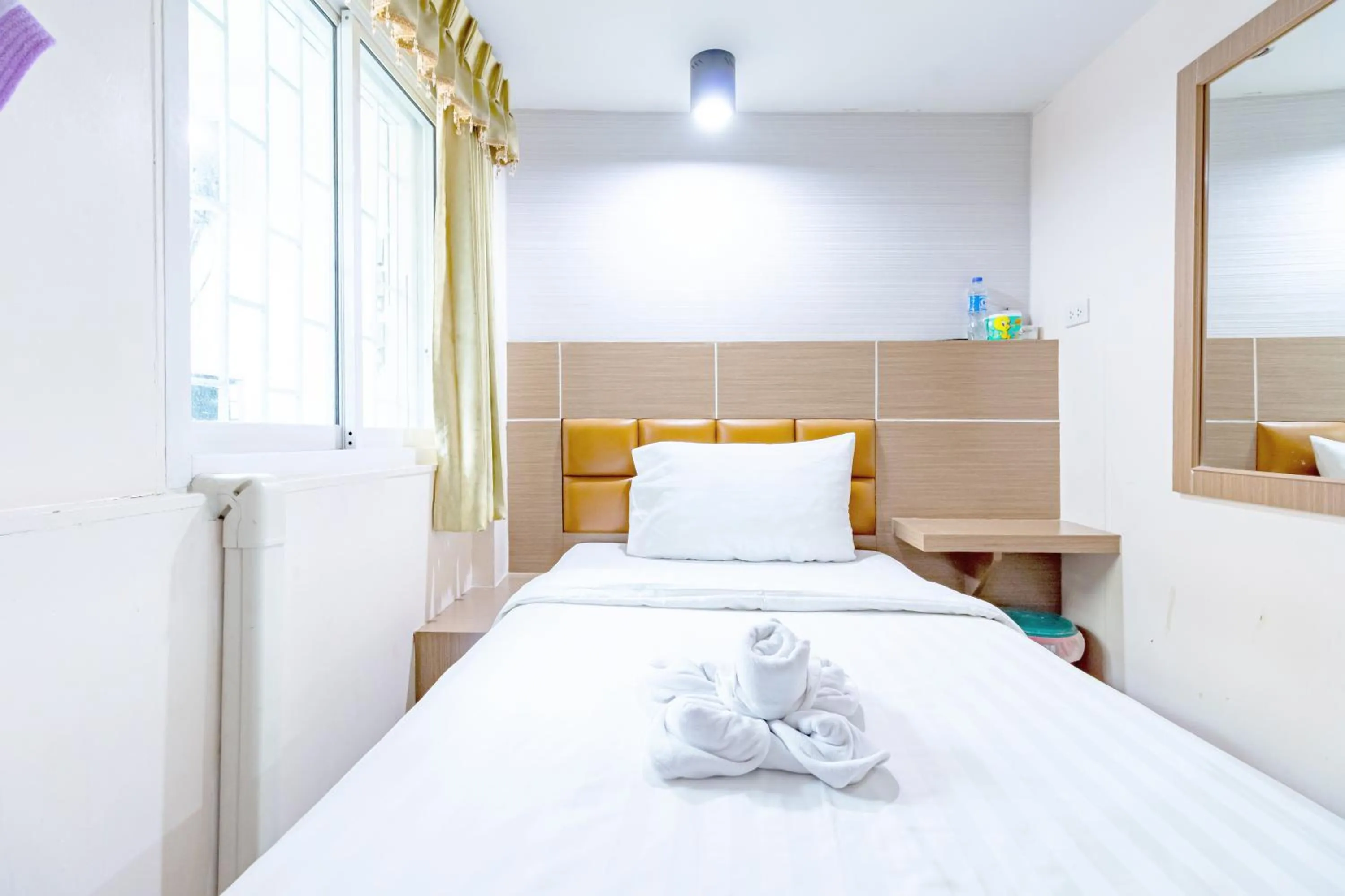 Bed in Oun Residence