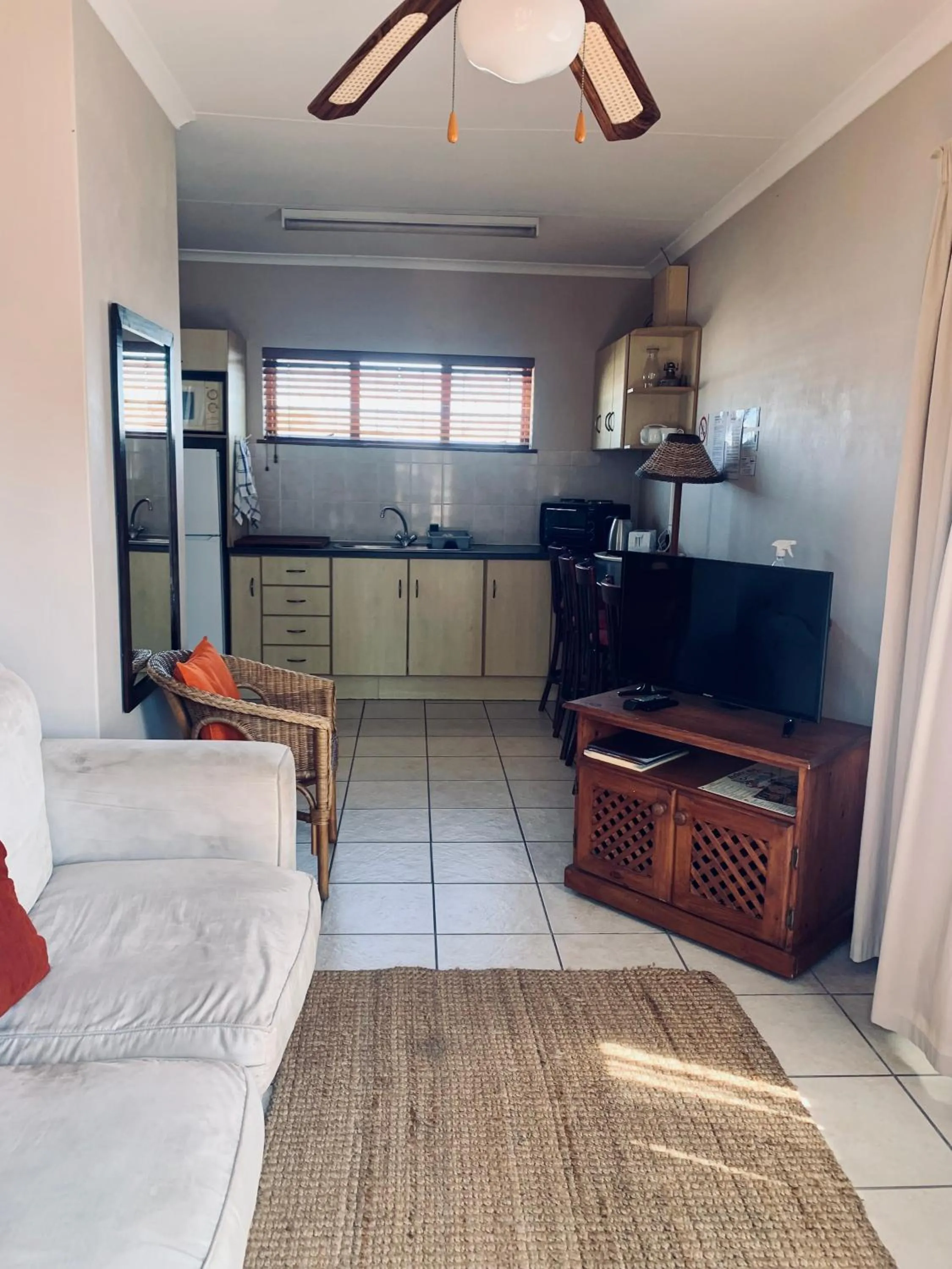 Communal lounge/ TV room in Summerstrand Beach Lodge