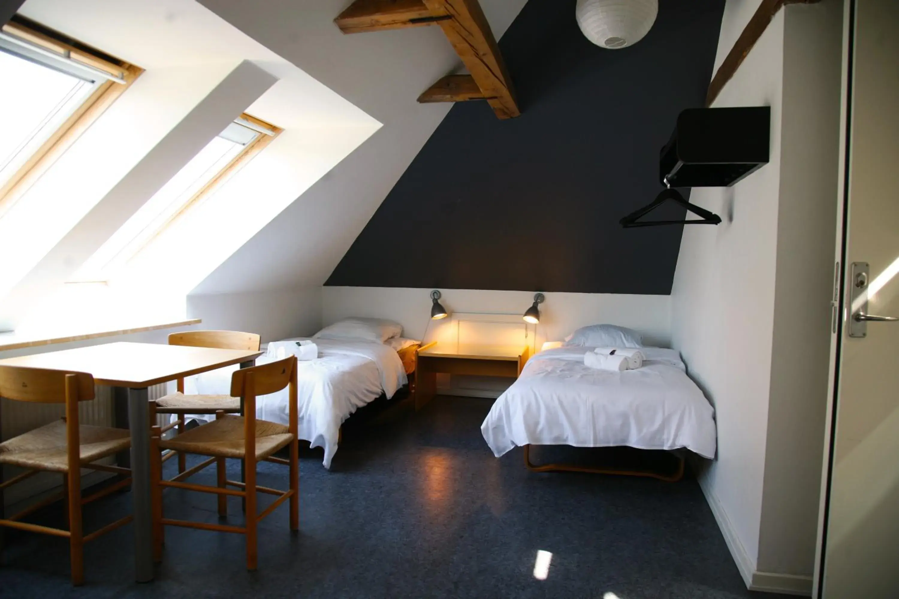 Quadruple Room with Shared Bathroom in Nexø Modern Hostel. Private Rooms Quadruple Room with Shared Bathroom in Nexø Modern Hostel. Private Rooms