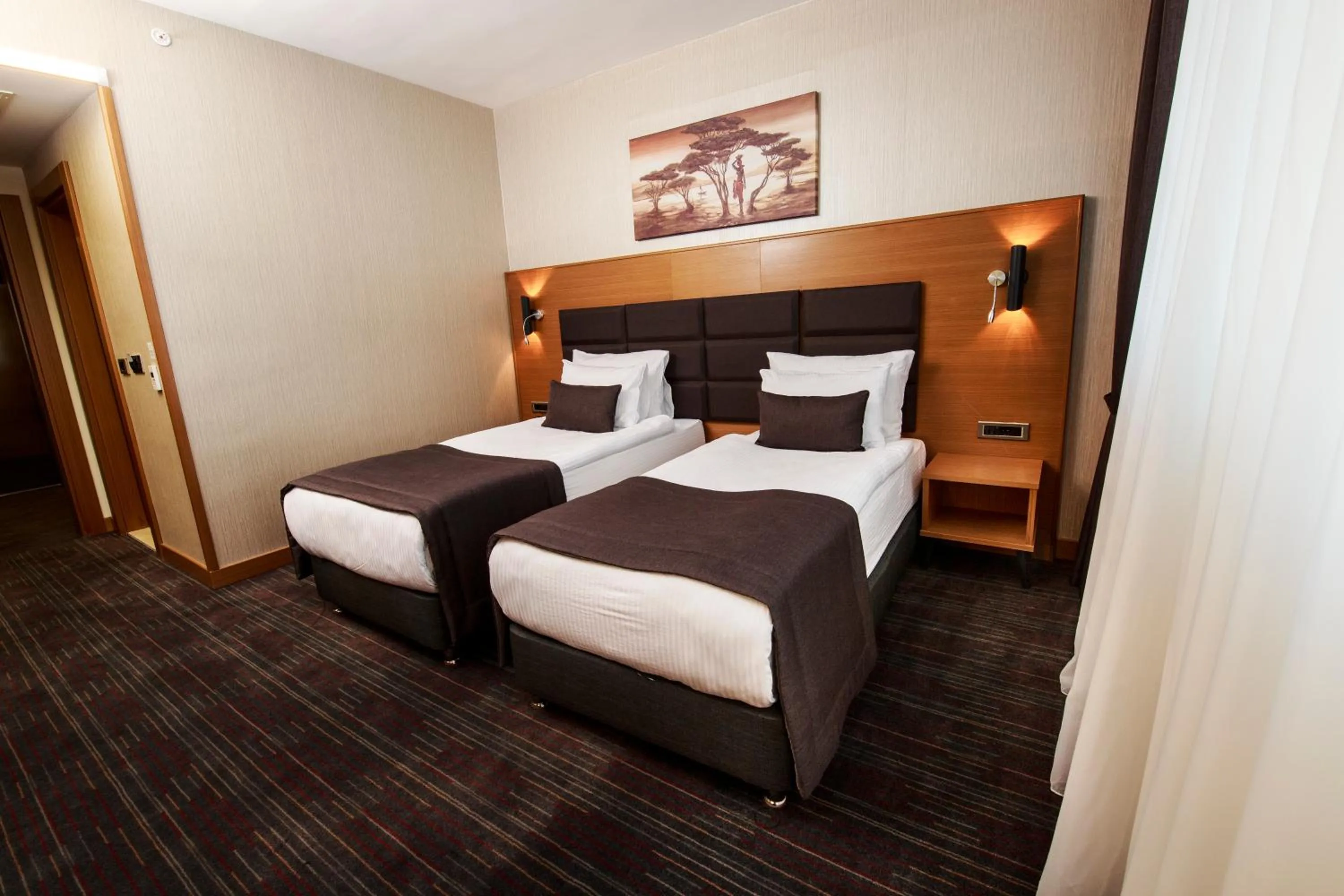 Bed in New Garden Hotel