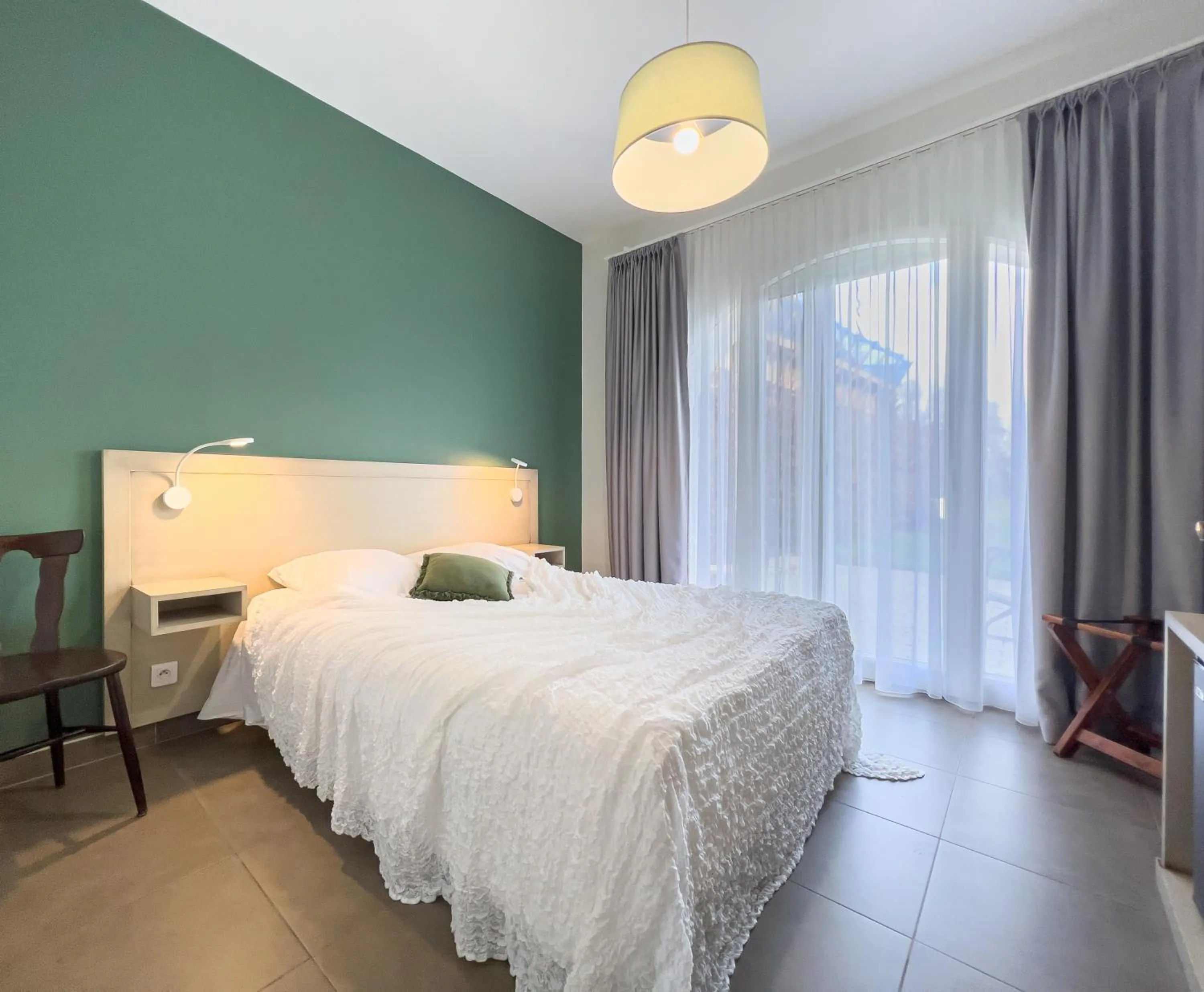 Bed in Gîtes et chambres d'hôtes Maison Ungerer