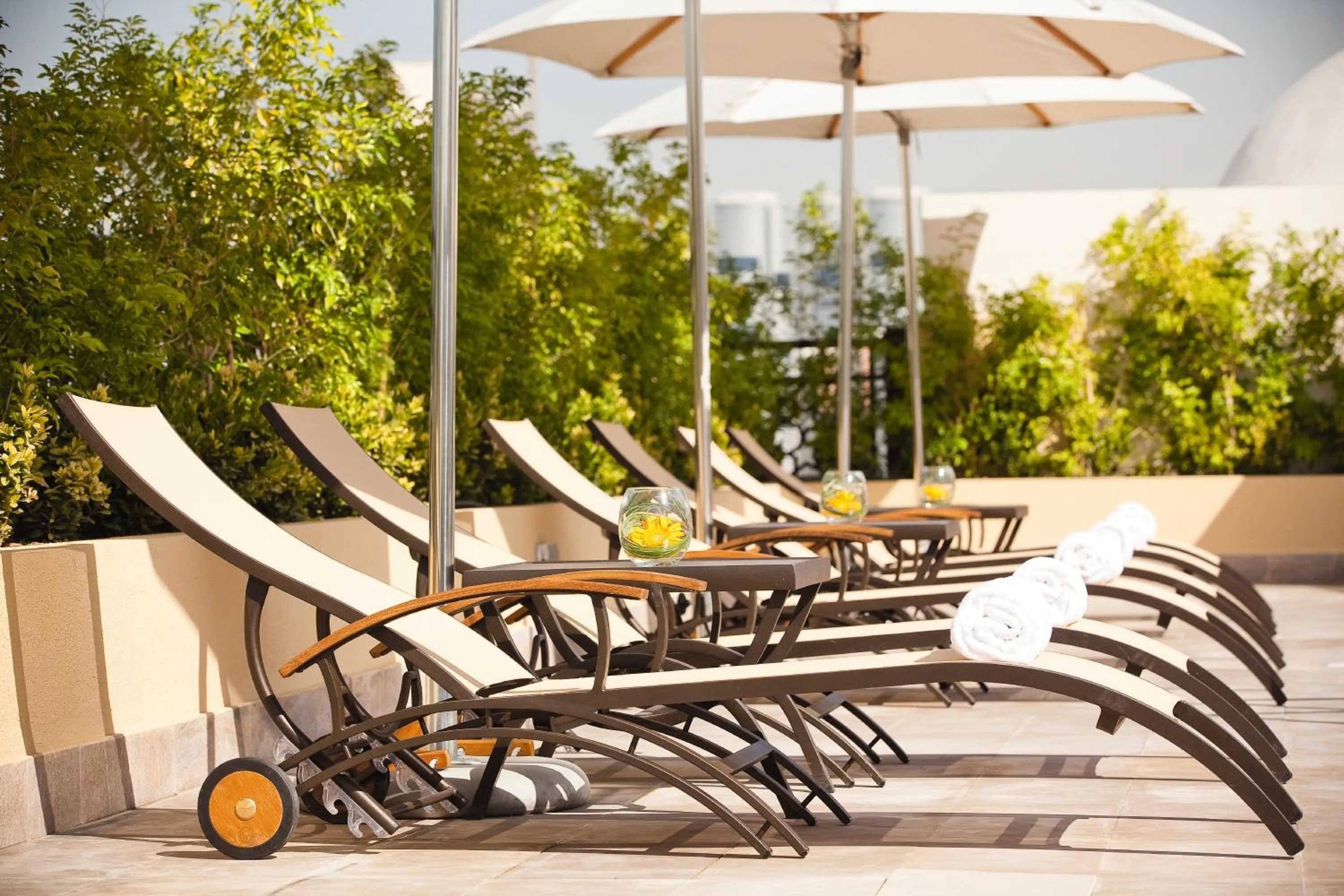 Swimming pool in Mövenpick Hotel Apartments Al Mamzar Dubai