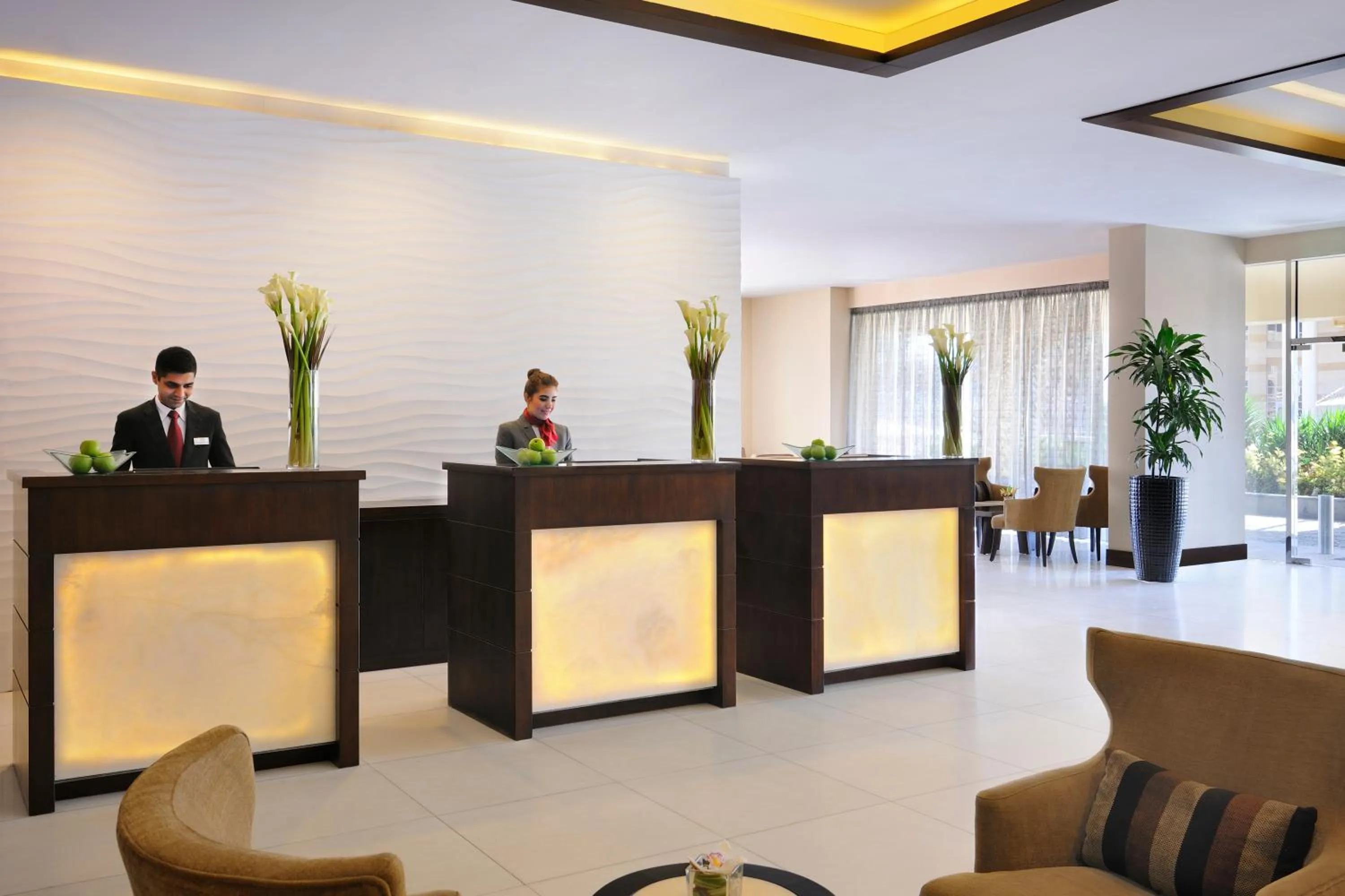 Lobby or reception in Mövenpick Hotel Apartments Al Mamzar Dubai