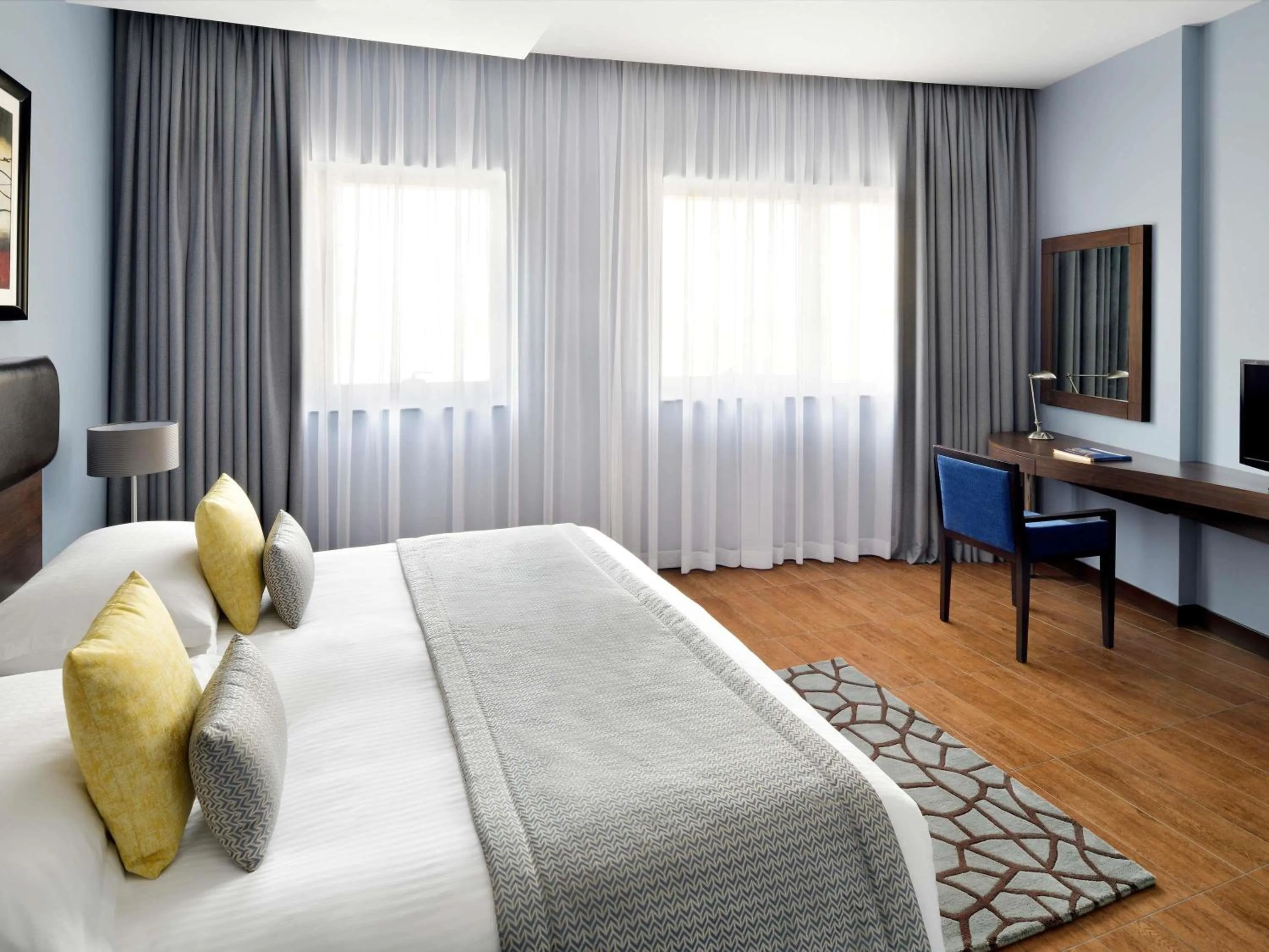 Bedroom, Bed in Mövenpick Hotel Apartments Al Mamzar Dubai