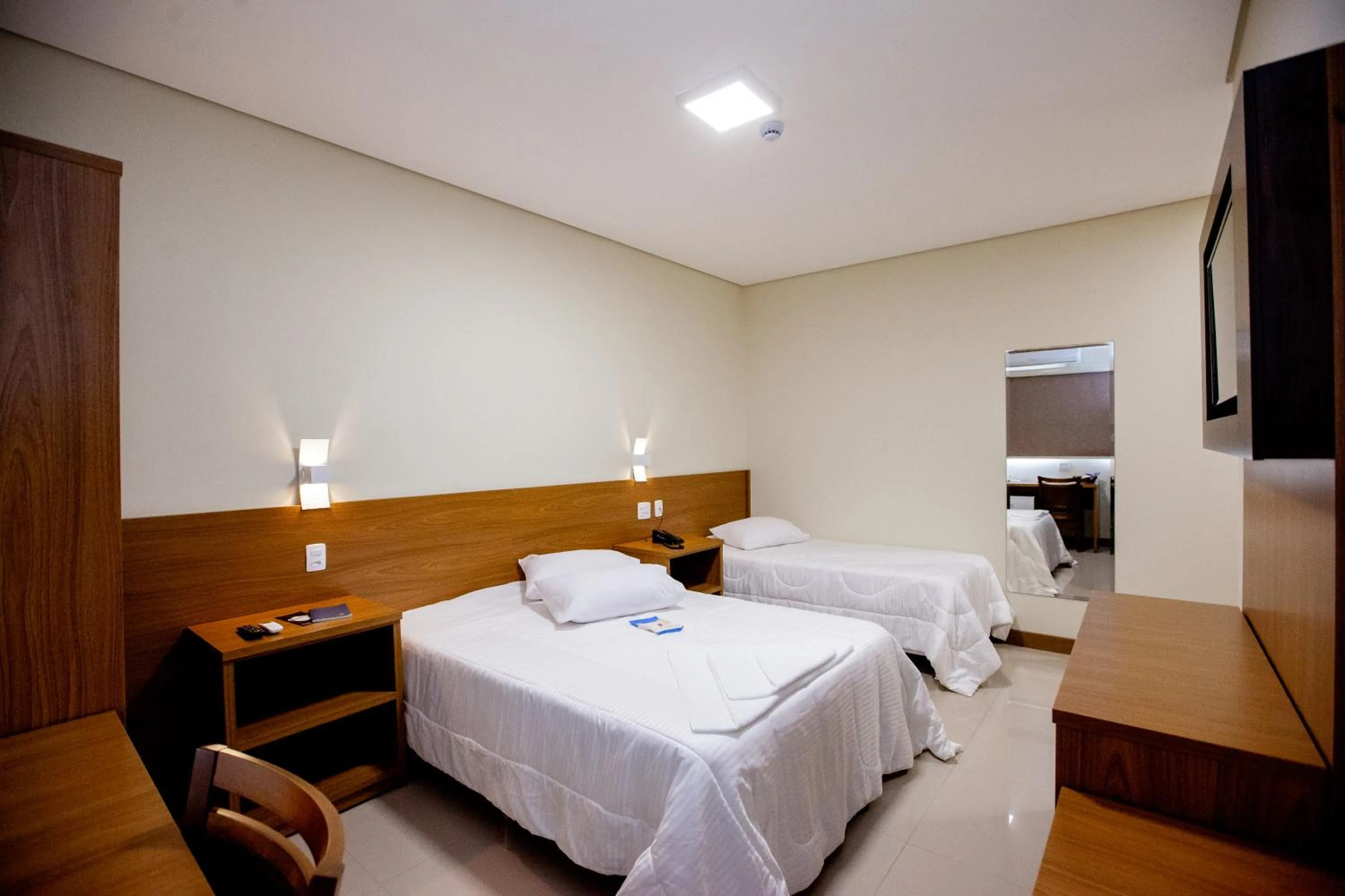 Bed in Ipê Palace Hotel