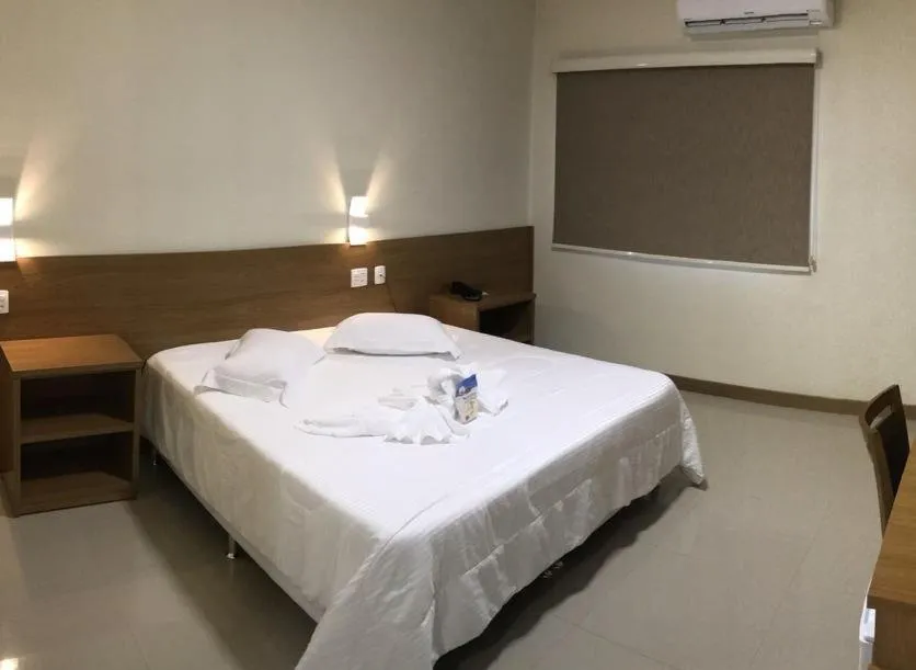 Bed in Ipê Palace Hotel