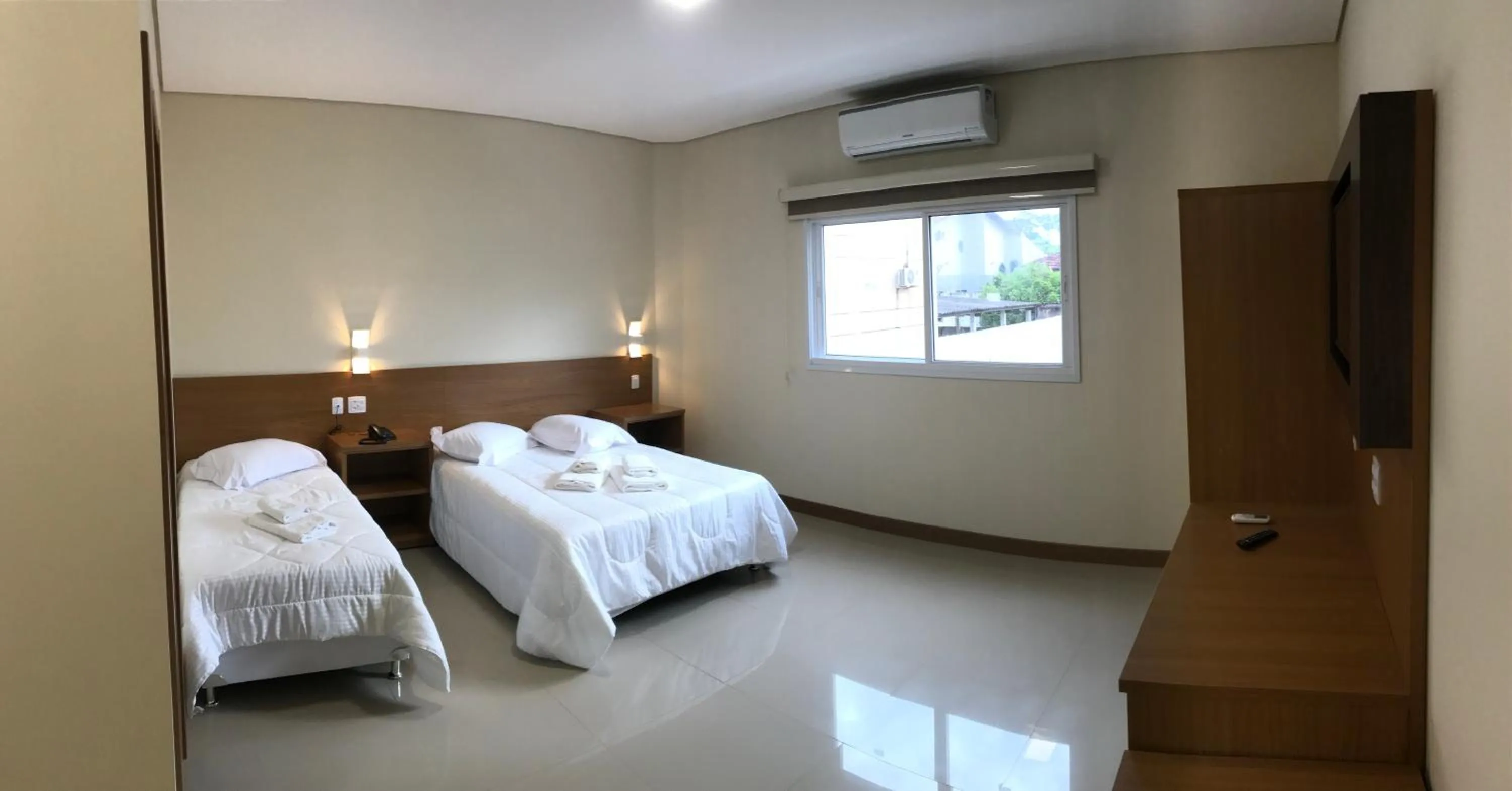 Bed in Ipê Palace Hotel