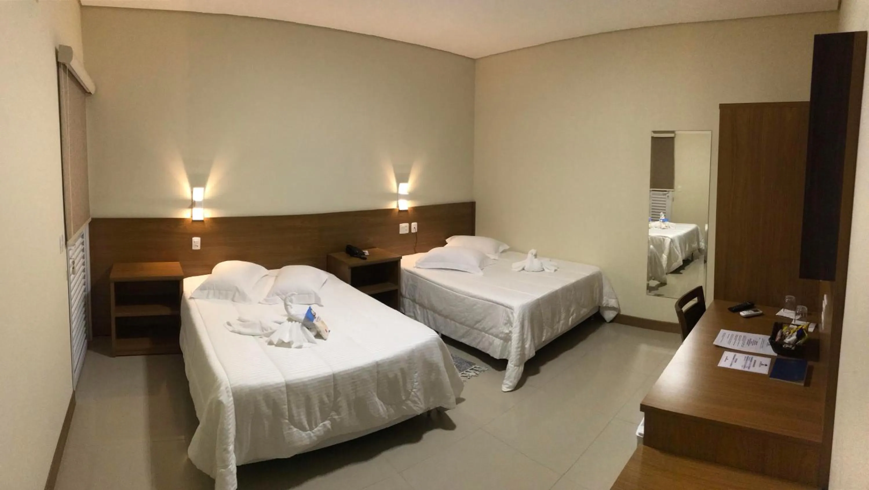 Bed in Ipê Palace Hotel