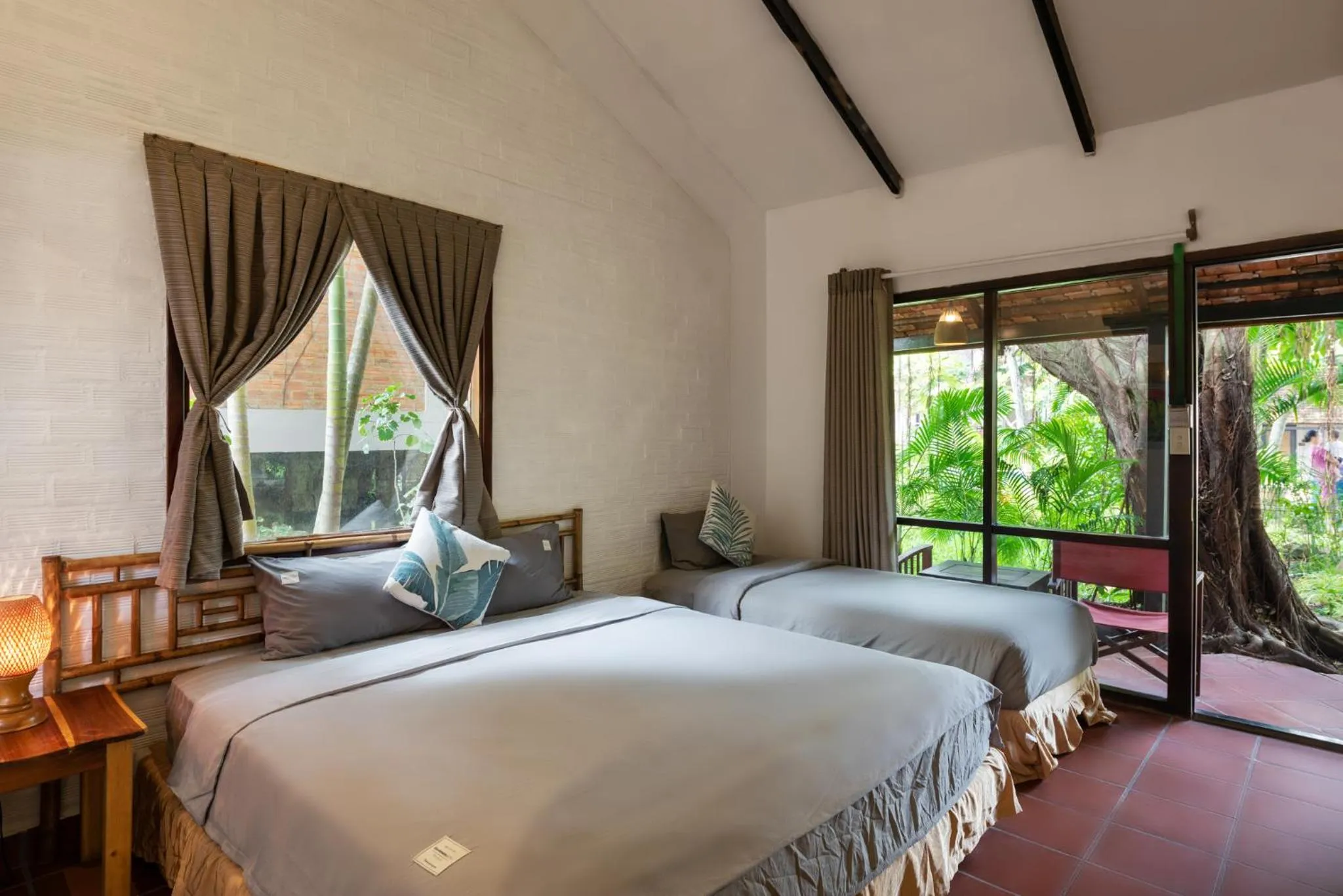 Bed in An Nhien Retreat Phu Quoc with Yoga Daily & Beach access