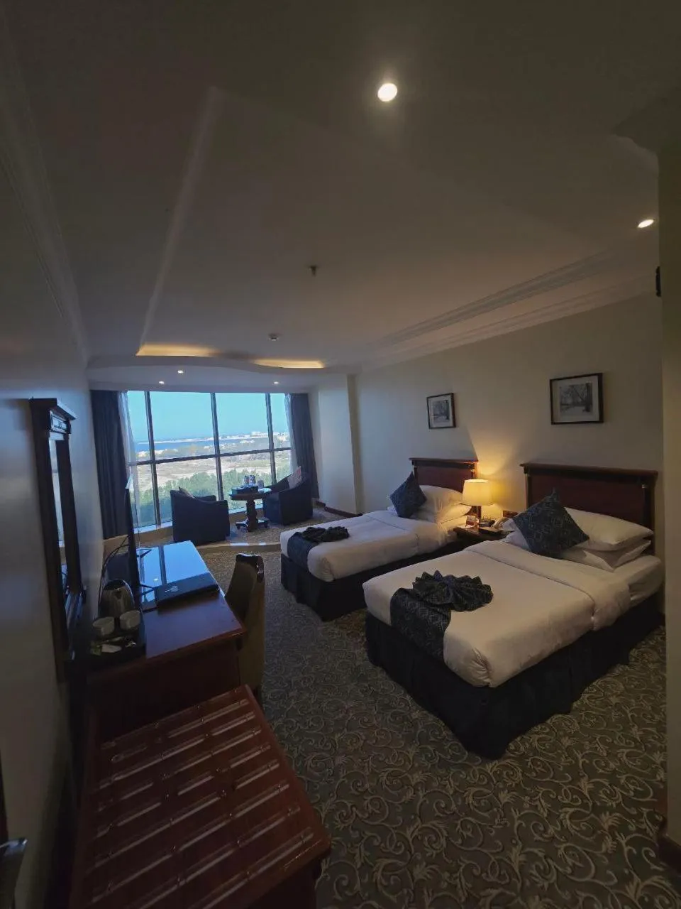 Bed in Crown Tower Hotel