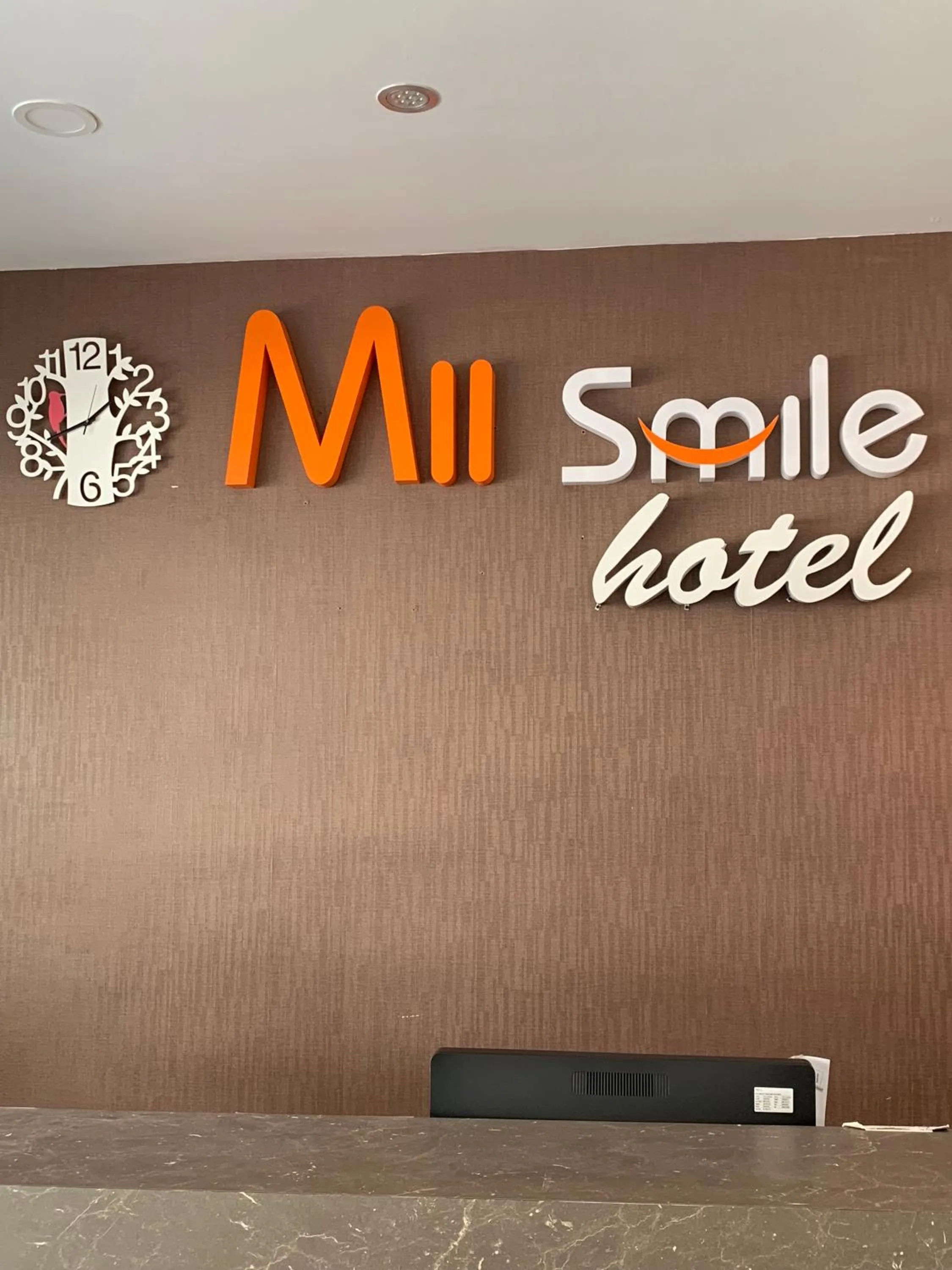 Property logo or sign in Mii Smile Hotel Penang
